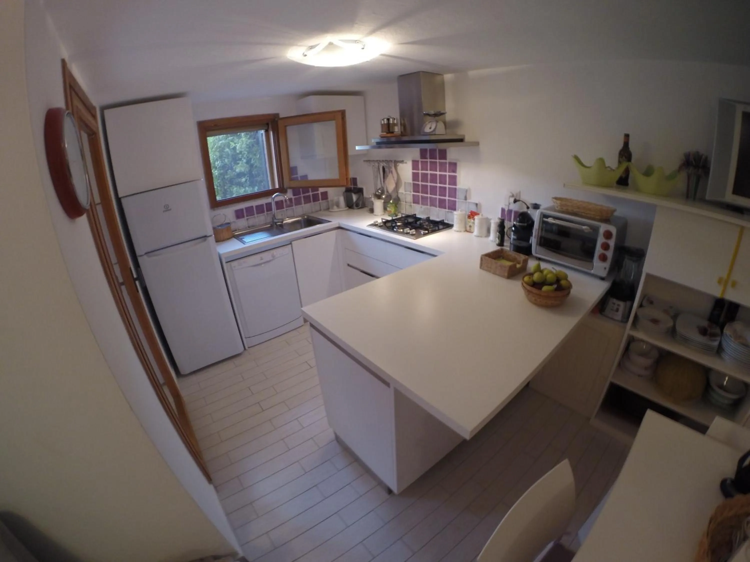 Kitchen or kitchenette in Luxury Apartment Sardegna