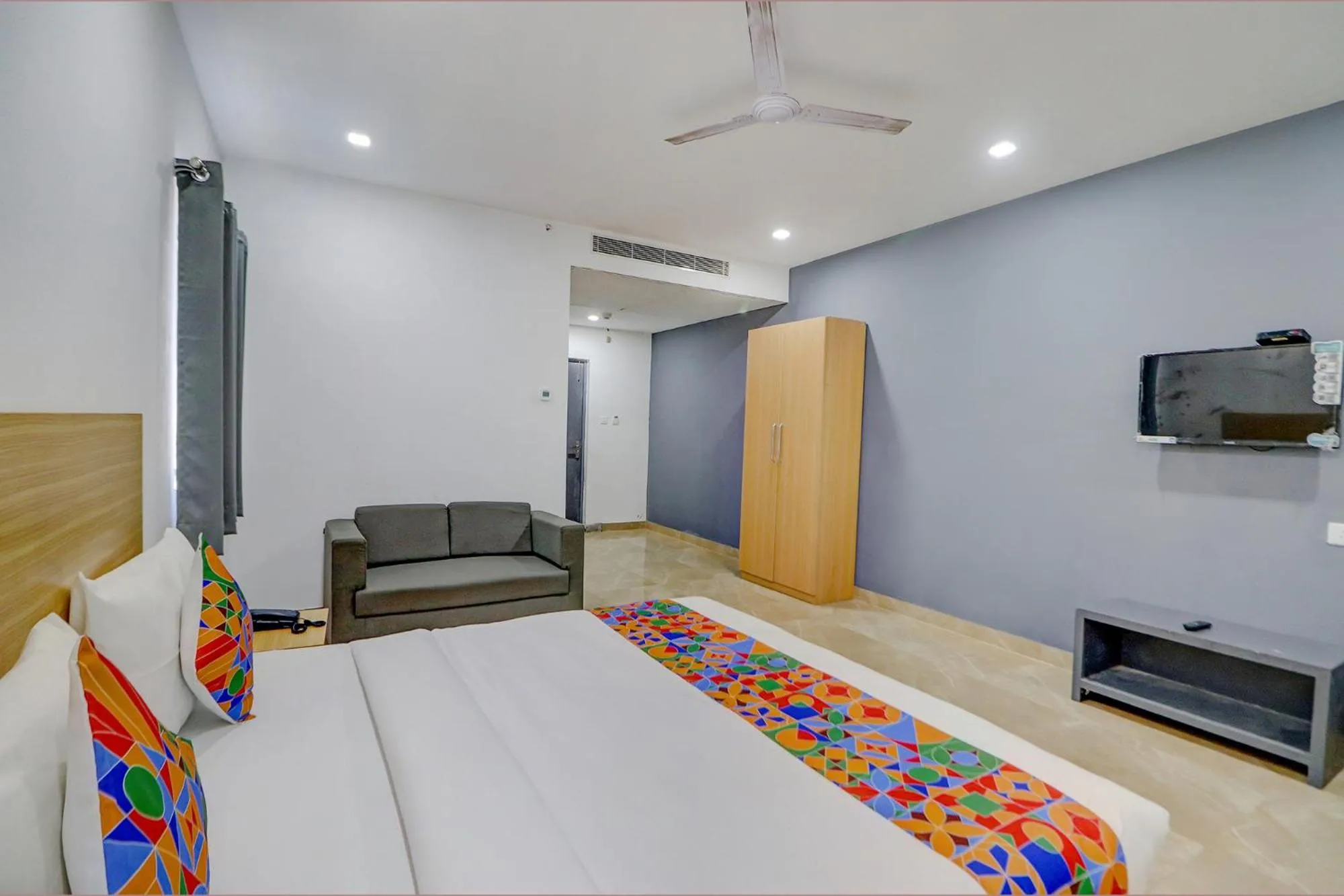Bed in FabHotel Premium Kashi - Sarnath museum