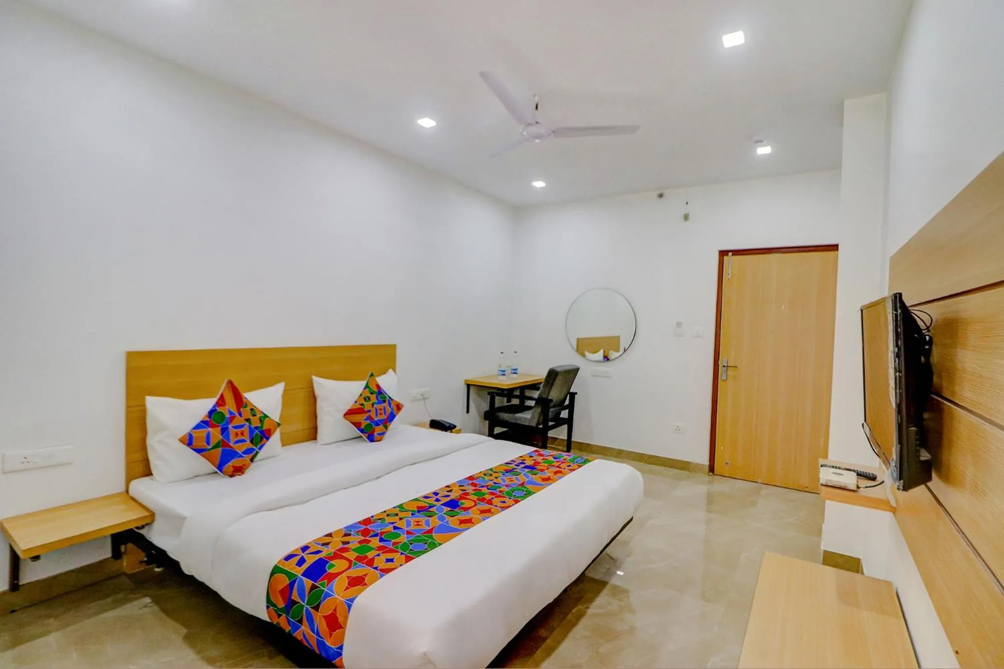 Bed in FabHotel Premium Kashi - Sarnath museum