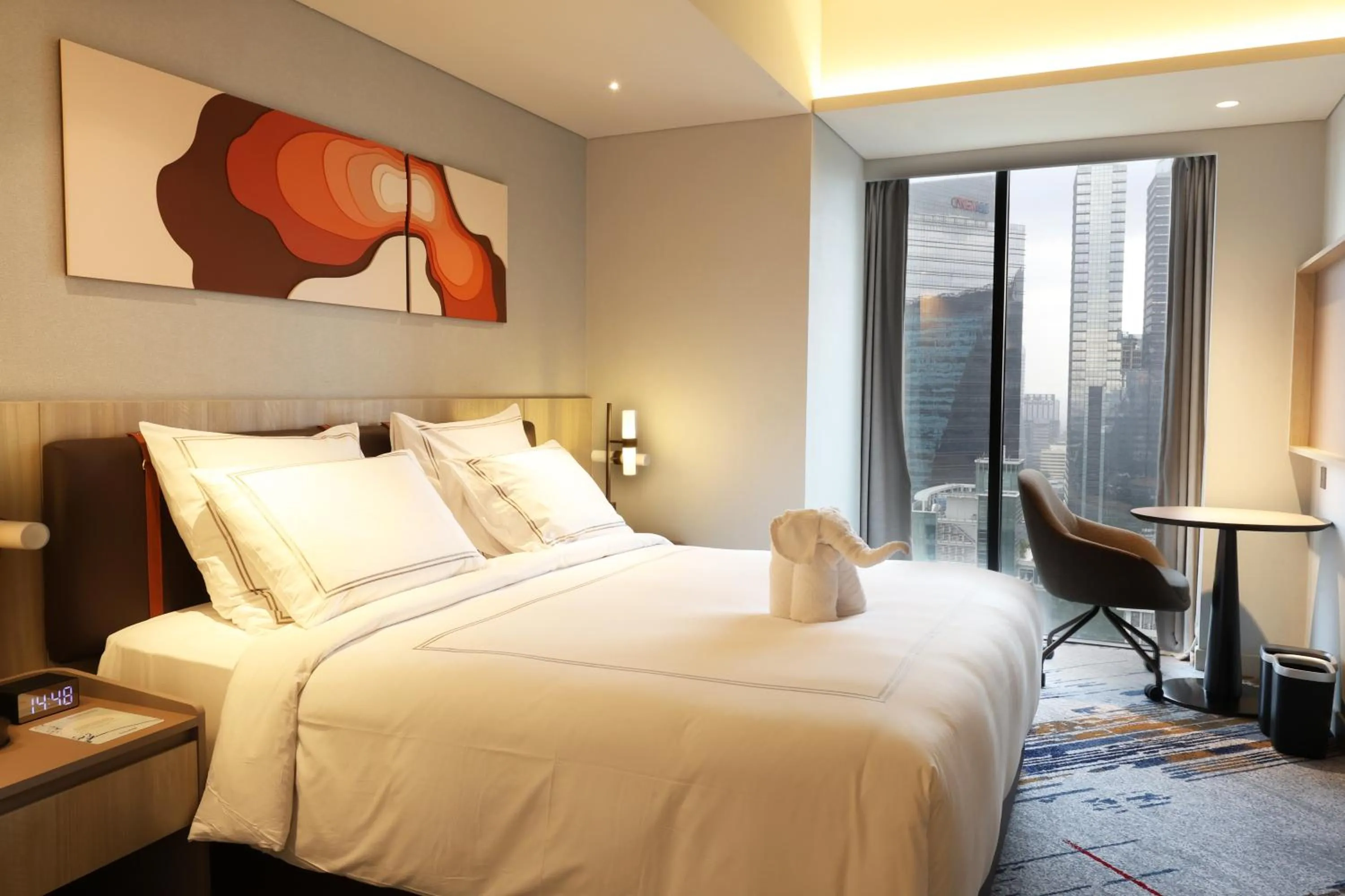 Bed in Swissôtel Living Jakarta Mega Kuningan