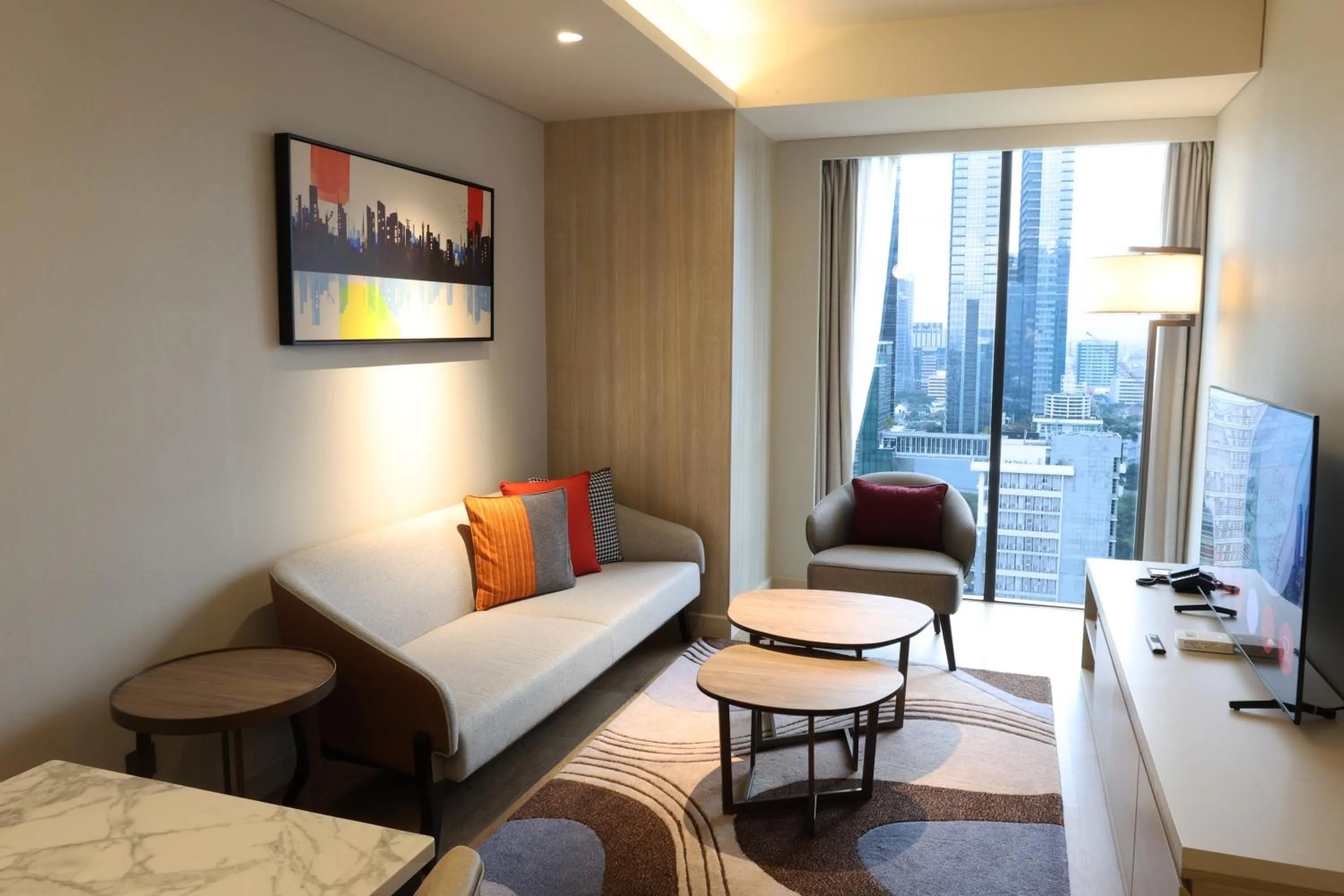 Living room, Bed in Swissôtel Living Jakarta Mega Kuningan