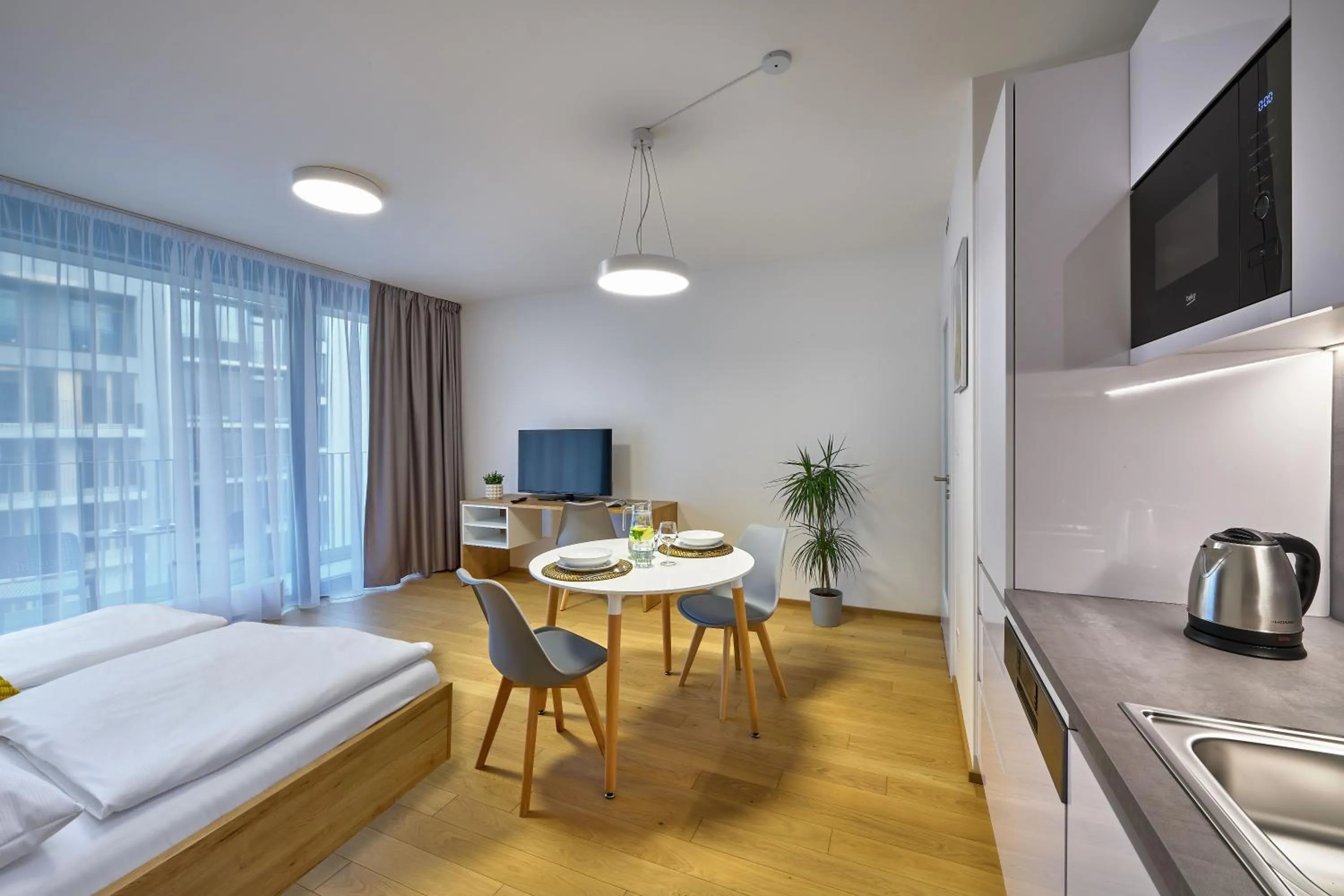 Bed in DownTown Suites Andel