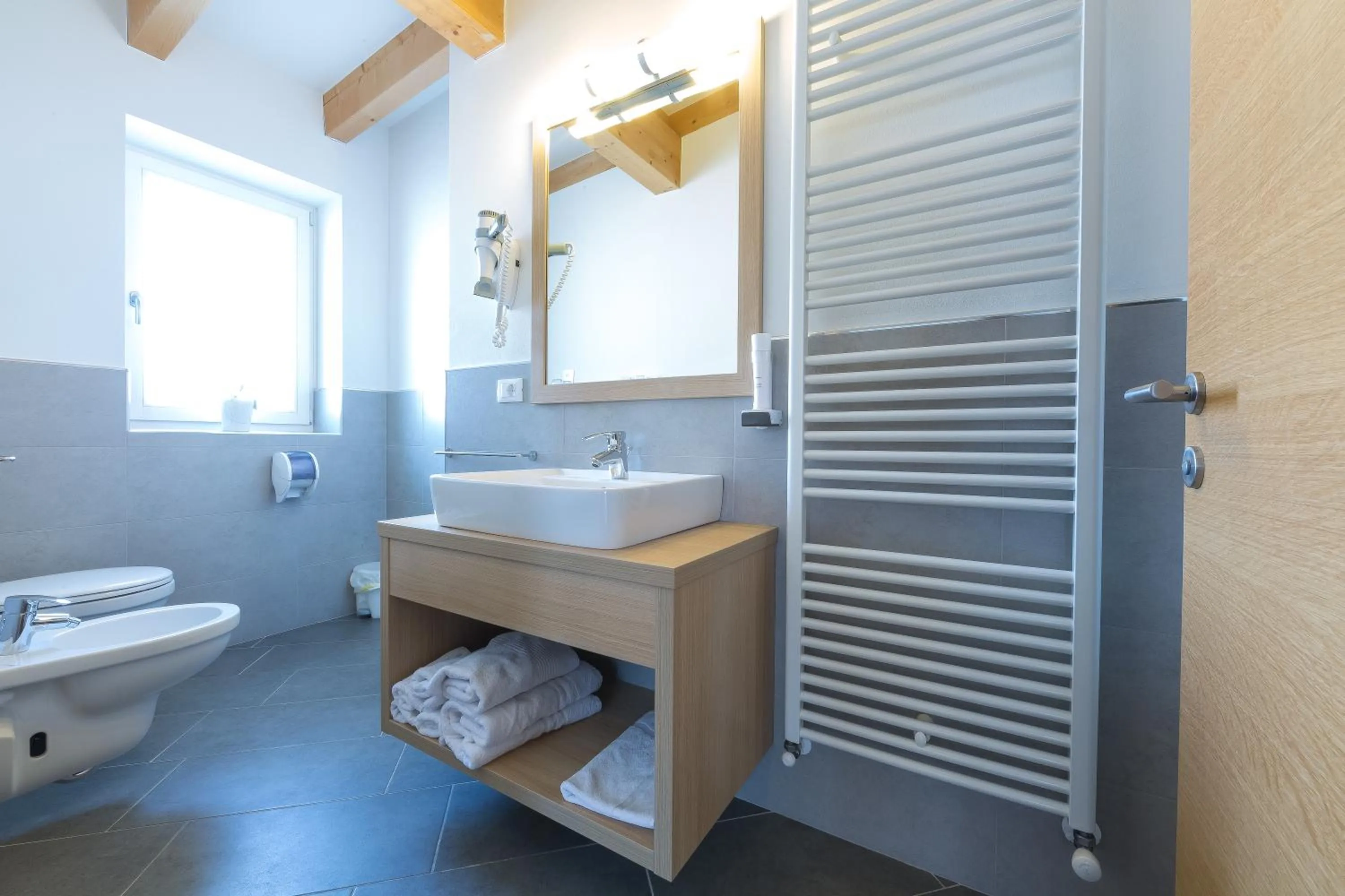 Photo of the whole room in Guesthouse Dolomiten