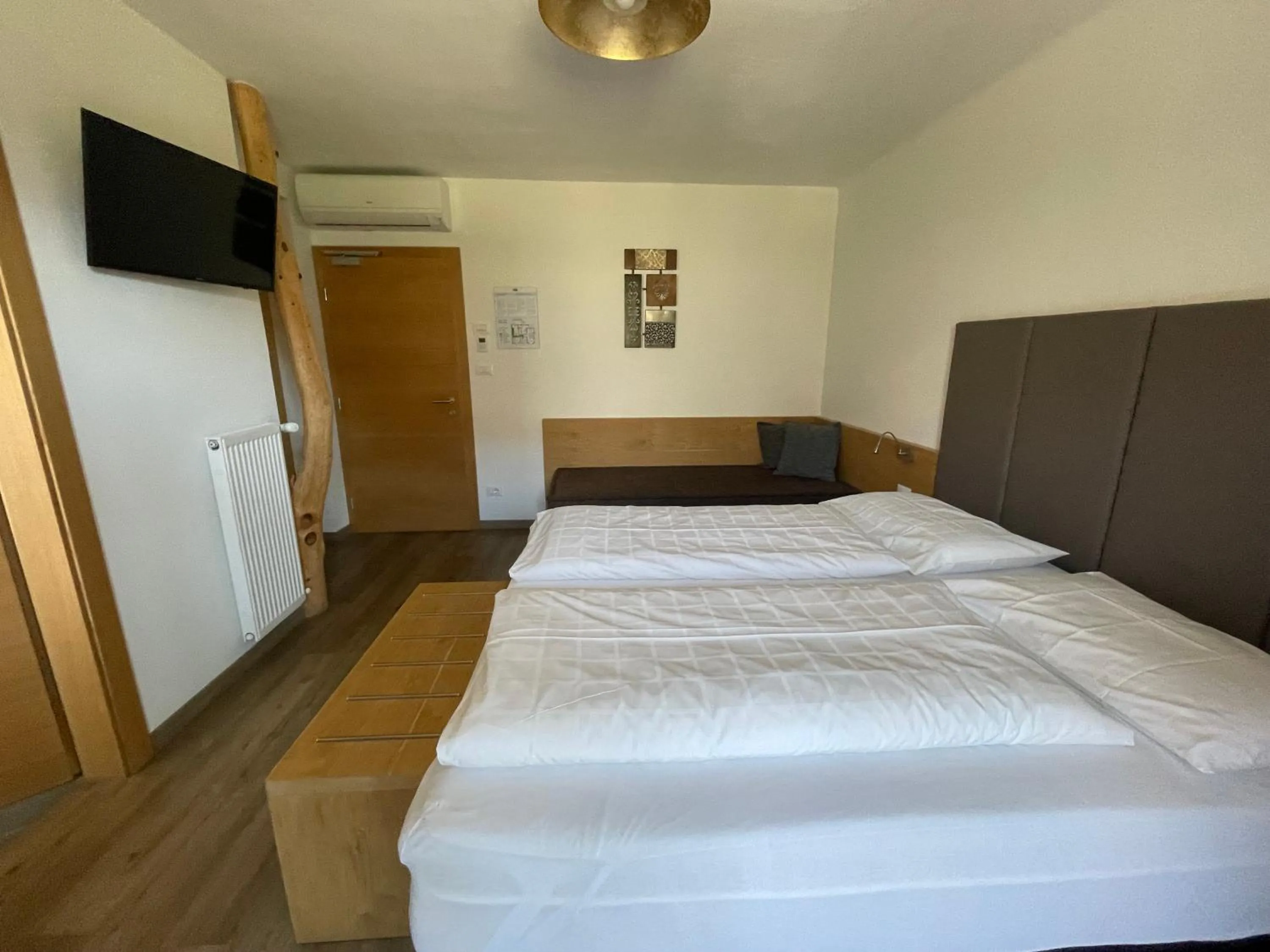 Bedroom, Bed in Guesthouse Dolomiten