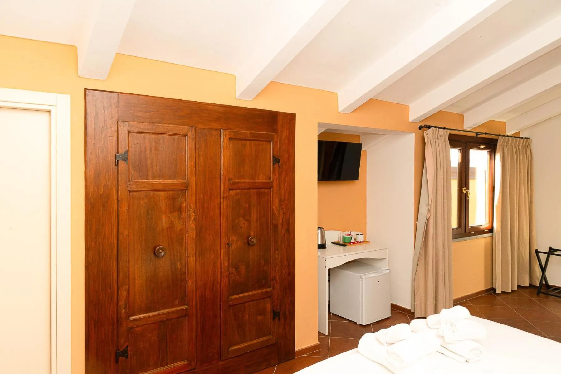 Photo of the whole room, Bed in La Rocca Relais