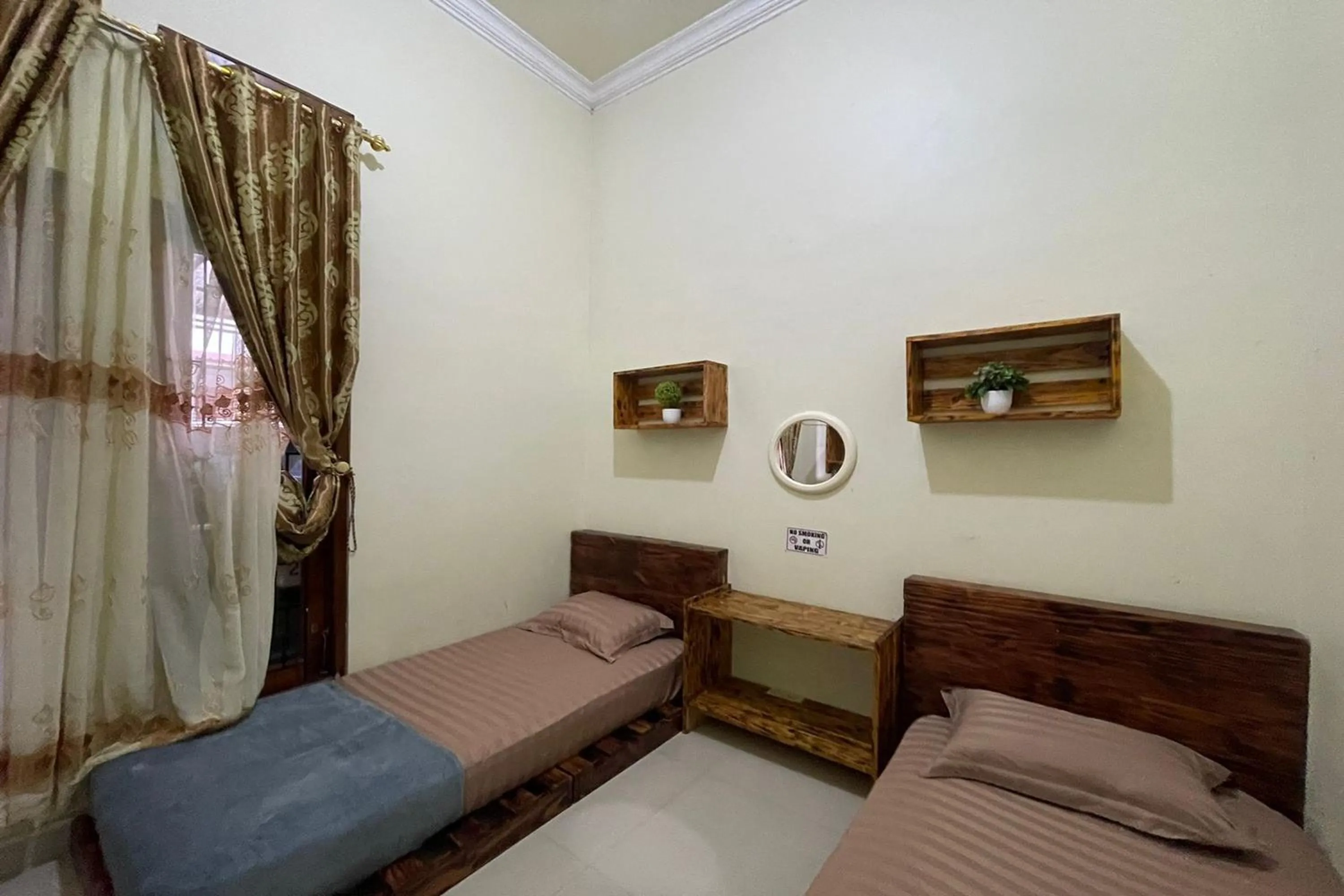 Bedroom, Bed in Jirek Homestay Bukittinggi