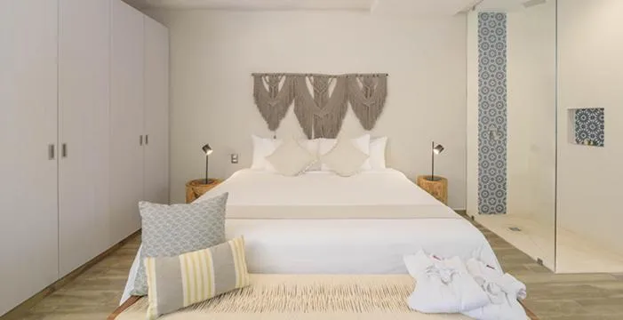 Bed in K'uyen Boutique Hotel