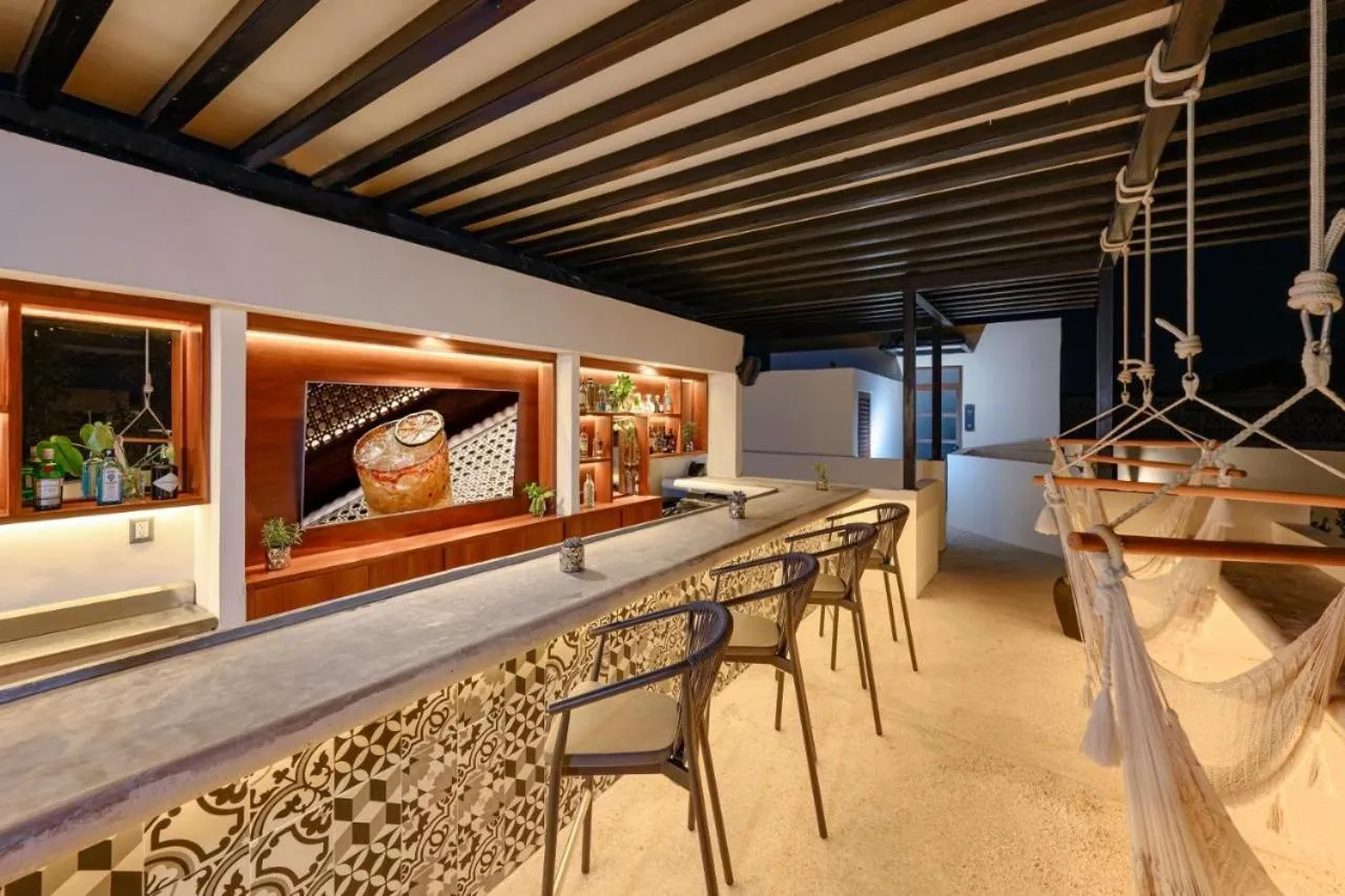 Lounge or bar in K'uyen Boutique Hotel