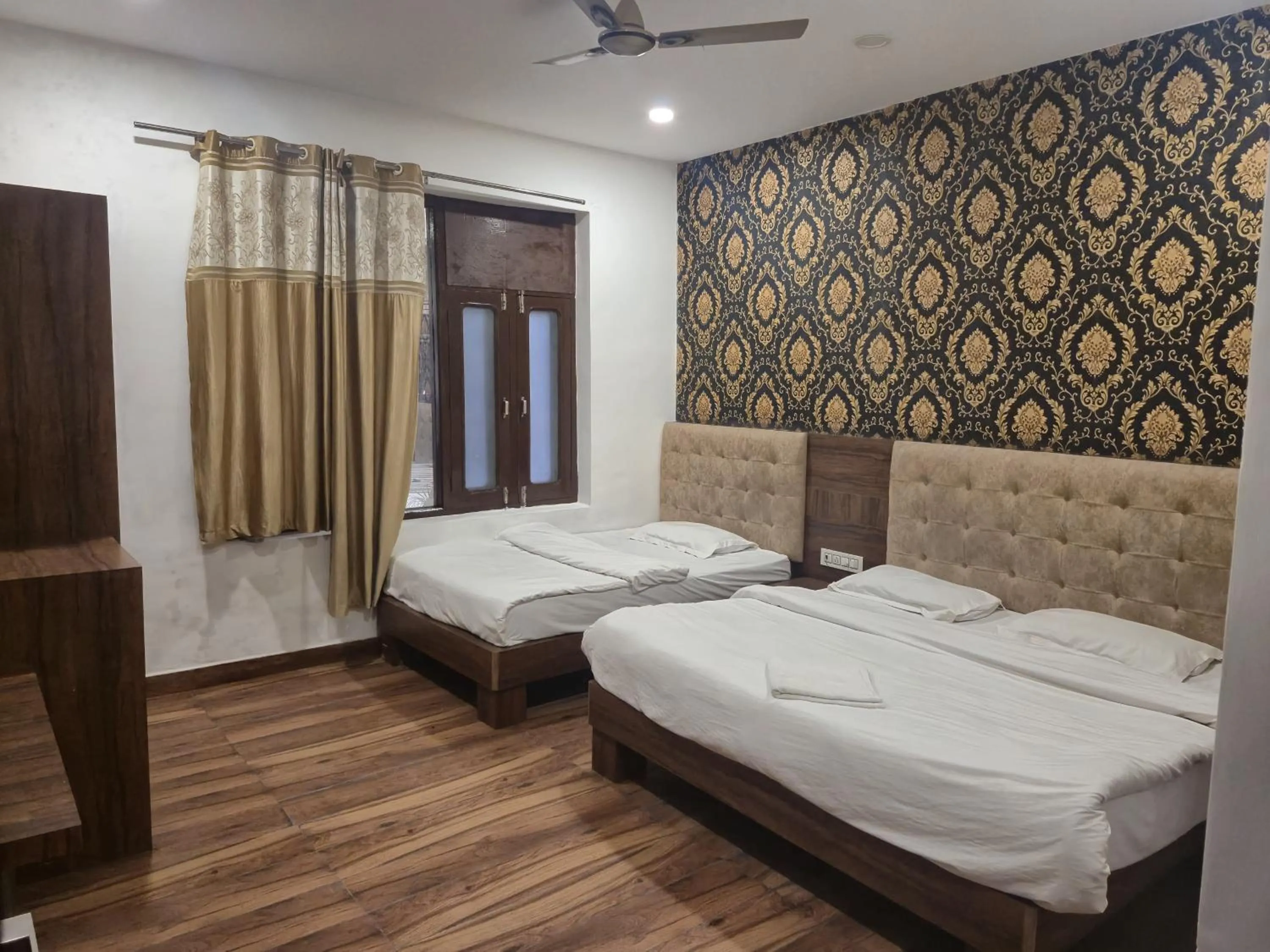 Photo of the whole room, Bed in JK Residency