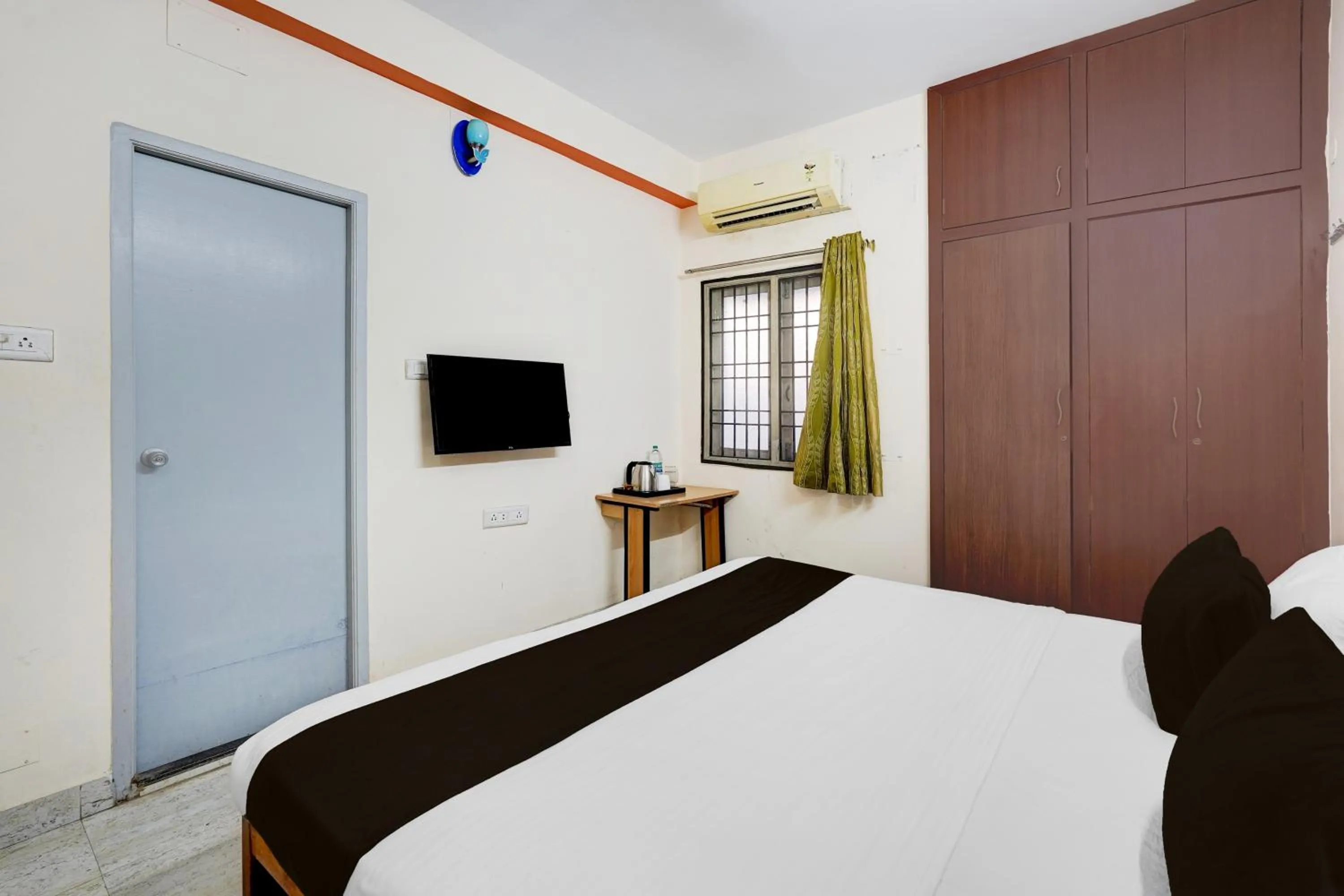 Bedroom, Bed in Super Townhouse Balaji Dental College Pallikarani Formerly Orchid Sankrish