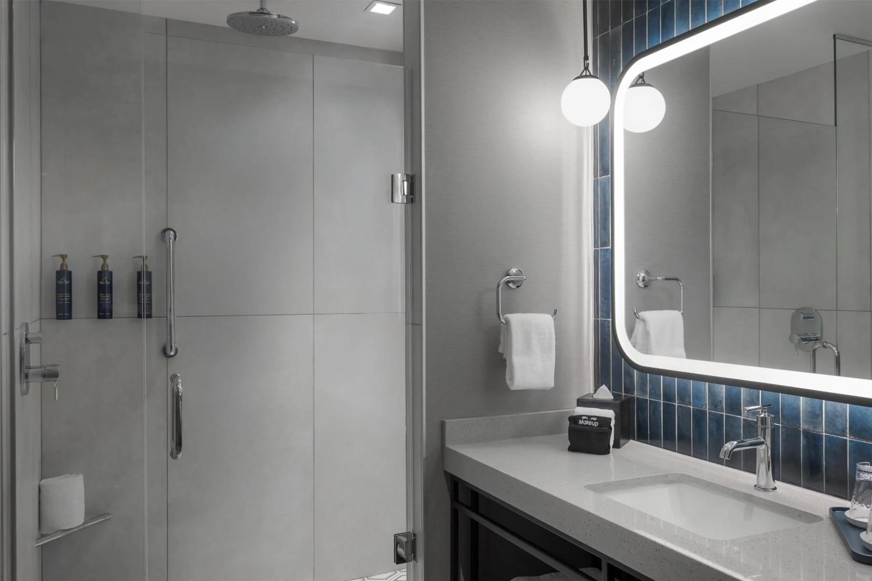 Bathroom in Hotel Avail Rogers, Tapestry Collection By Hilton