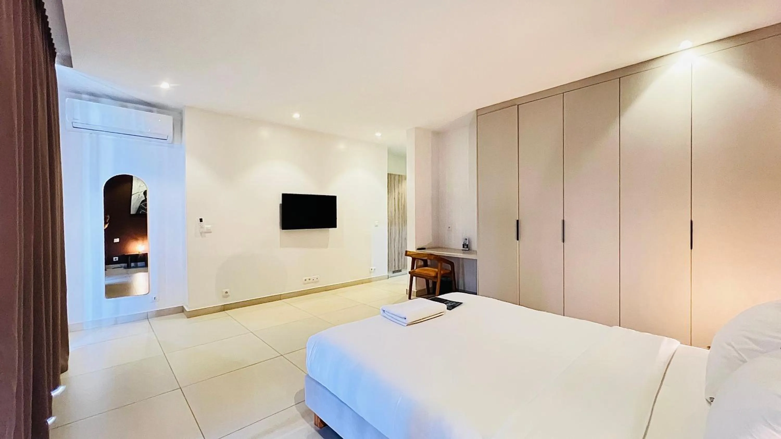 Bed in AfricaWorks Suites