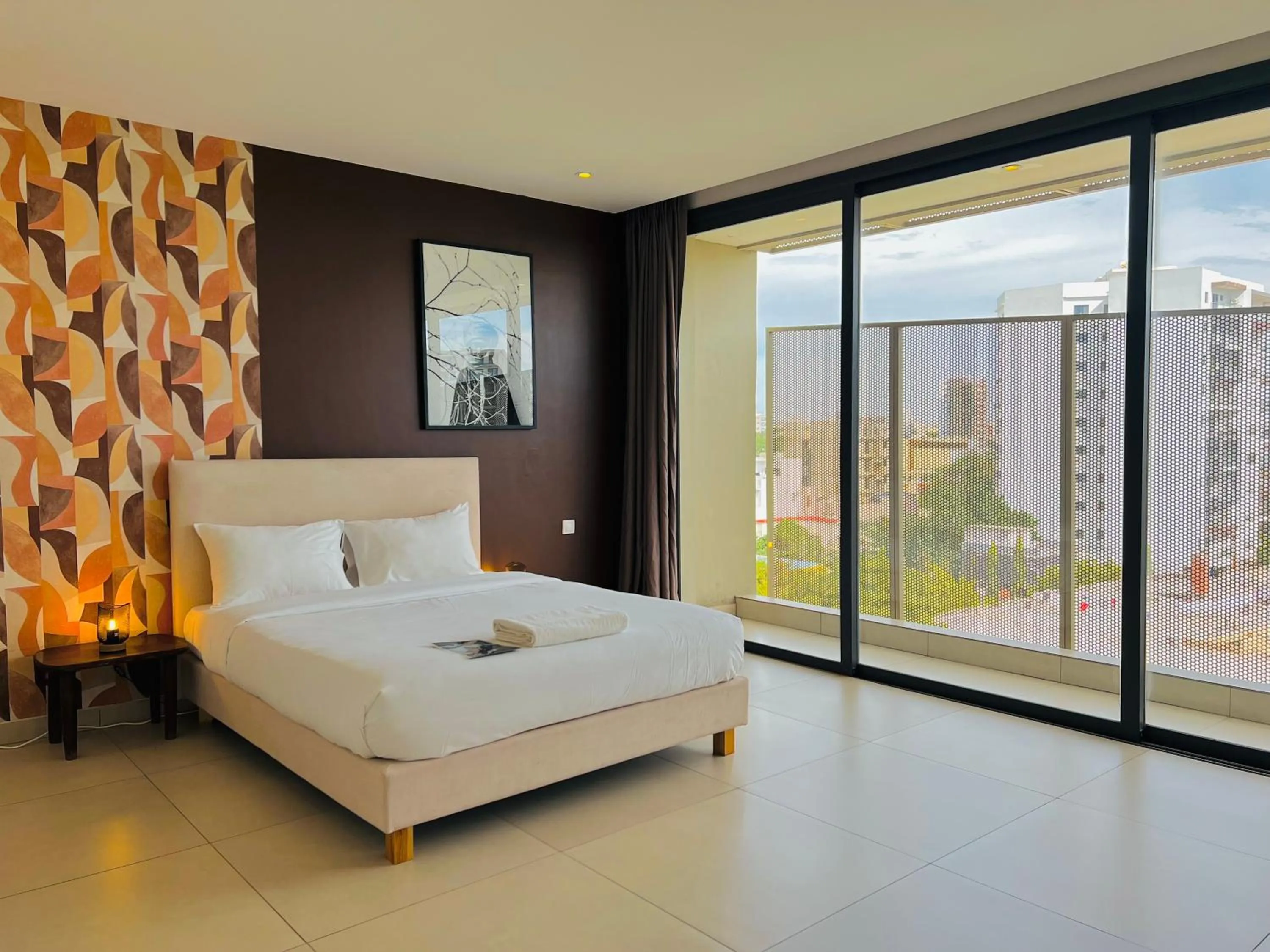 Bed in AfricaWorks Suites