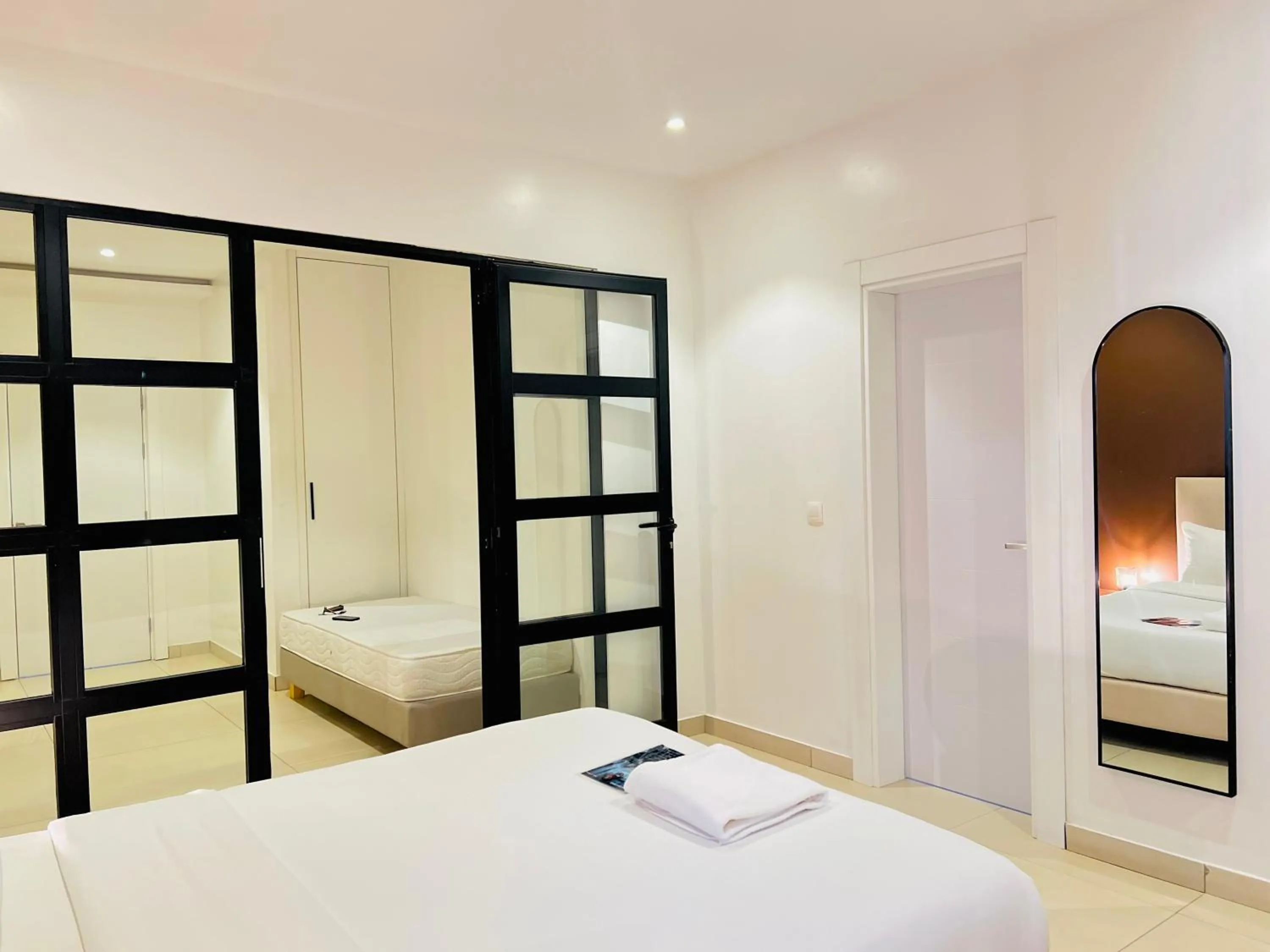 Bed in AfricaWorks Suites