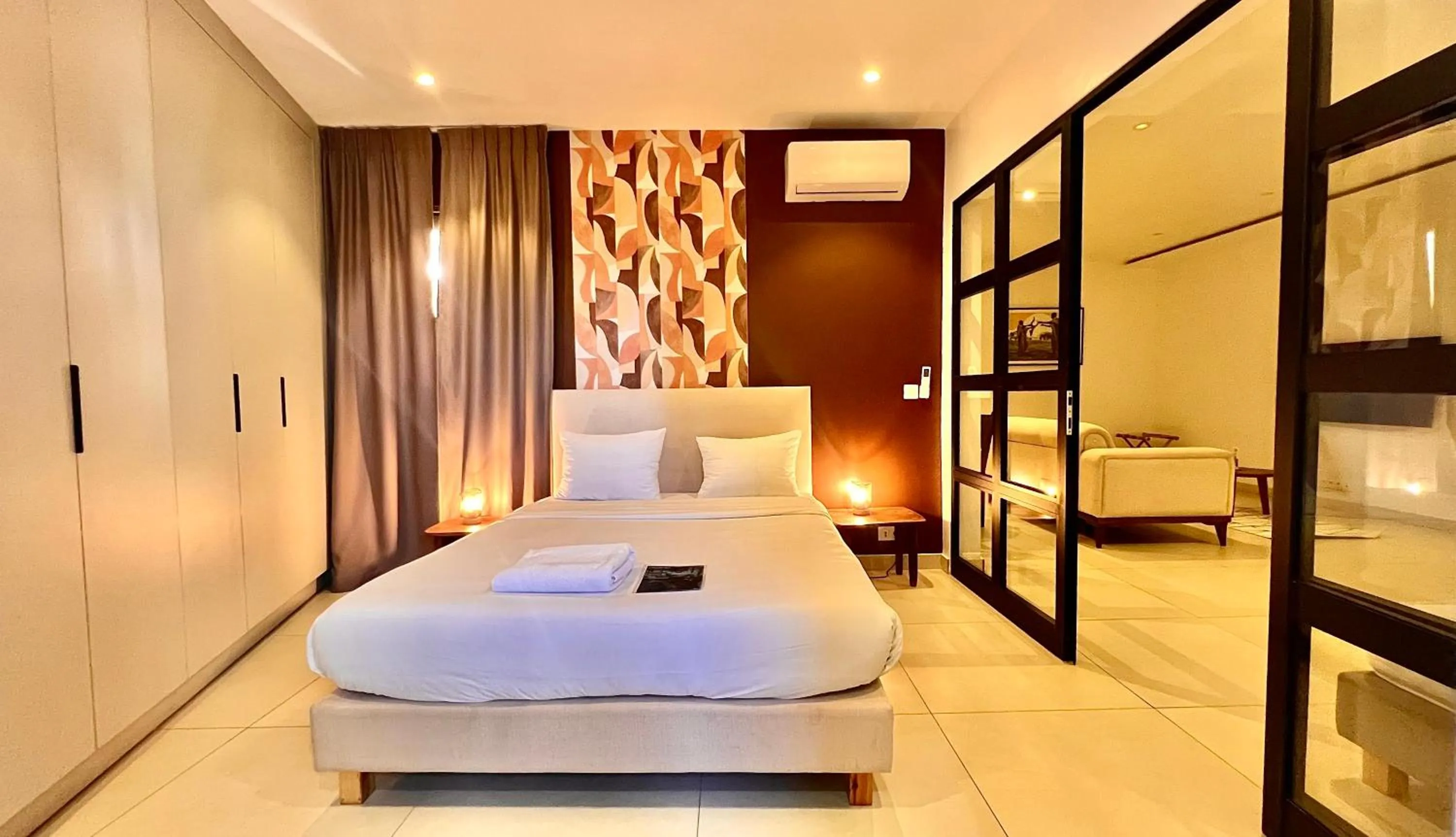 Bed in AfricaWorks Suites
