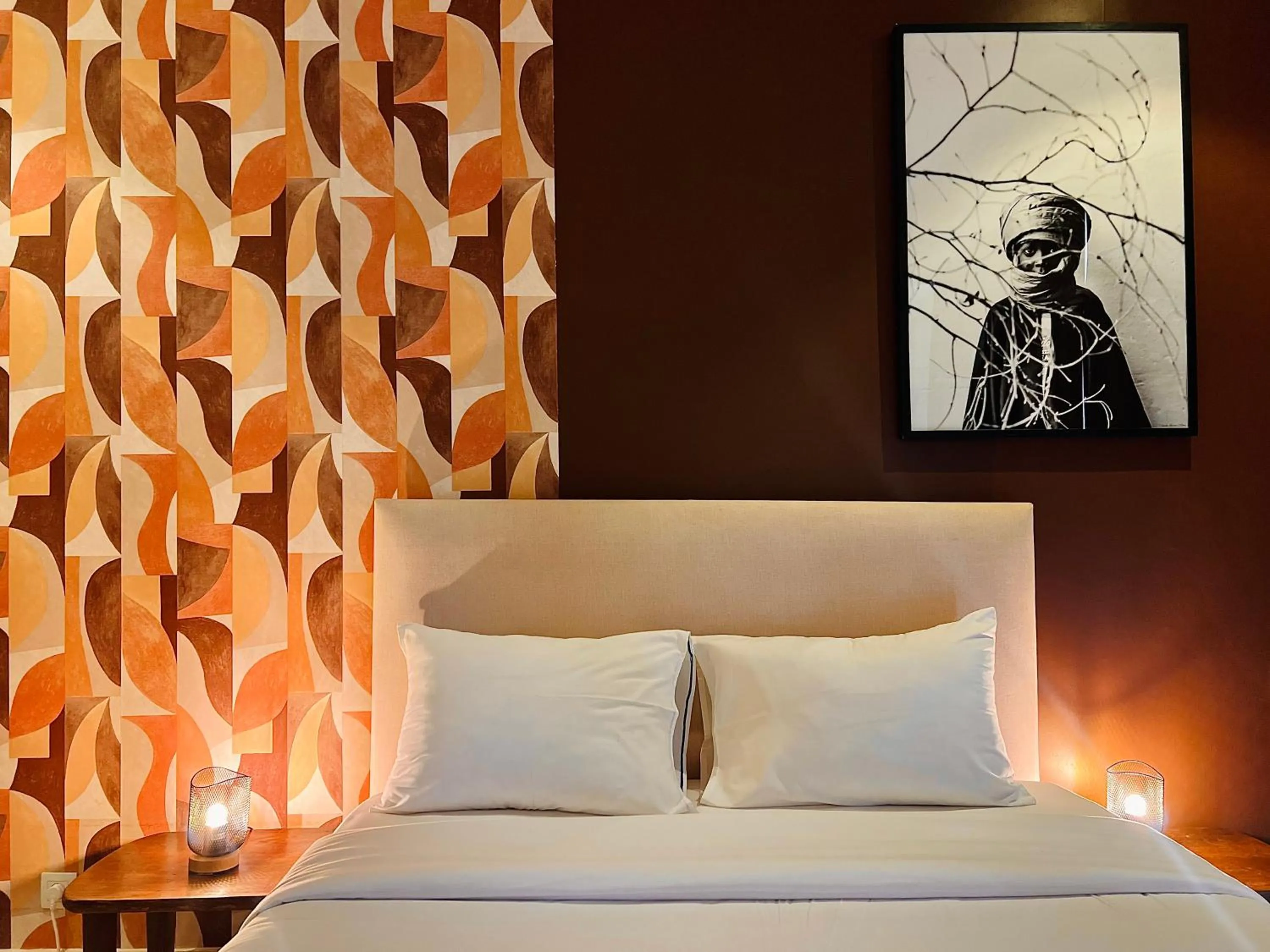 Bed in AfricaWorks Suites