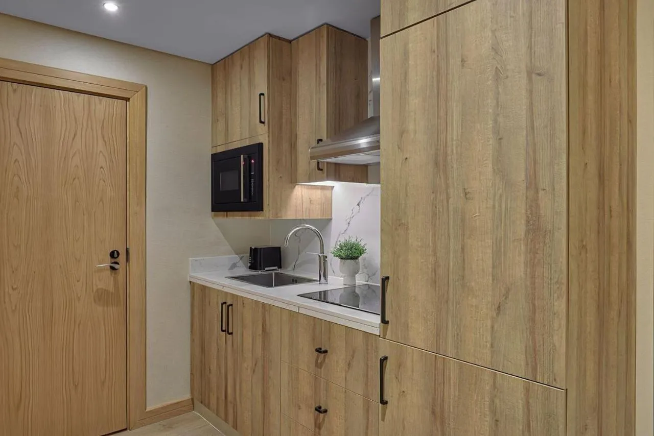 Kitchen or kitchenette in Makarem Haram view suites