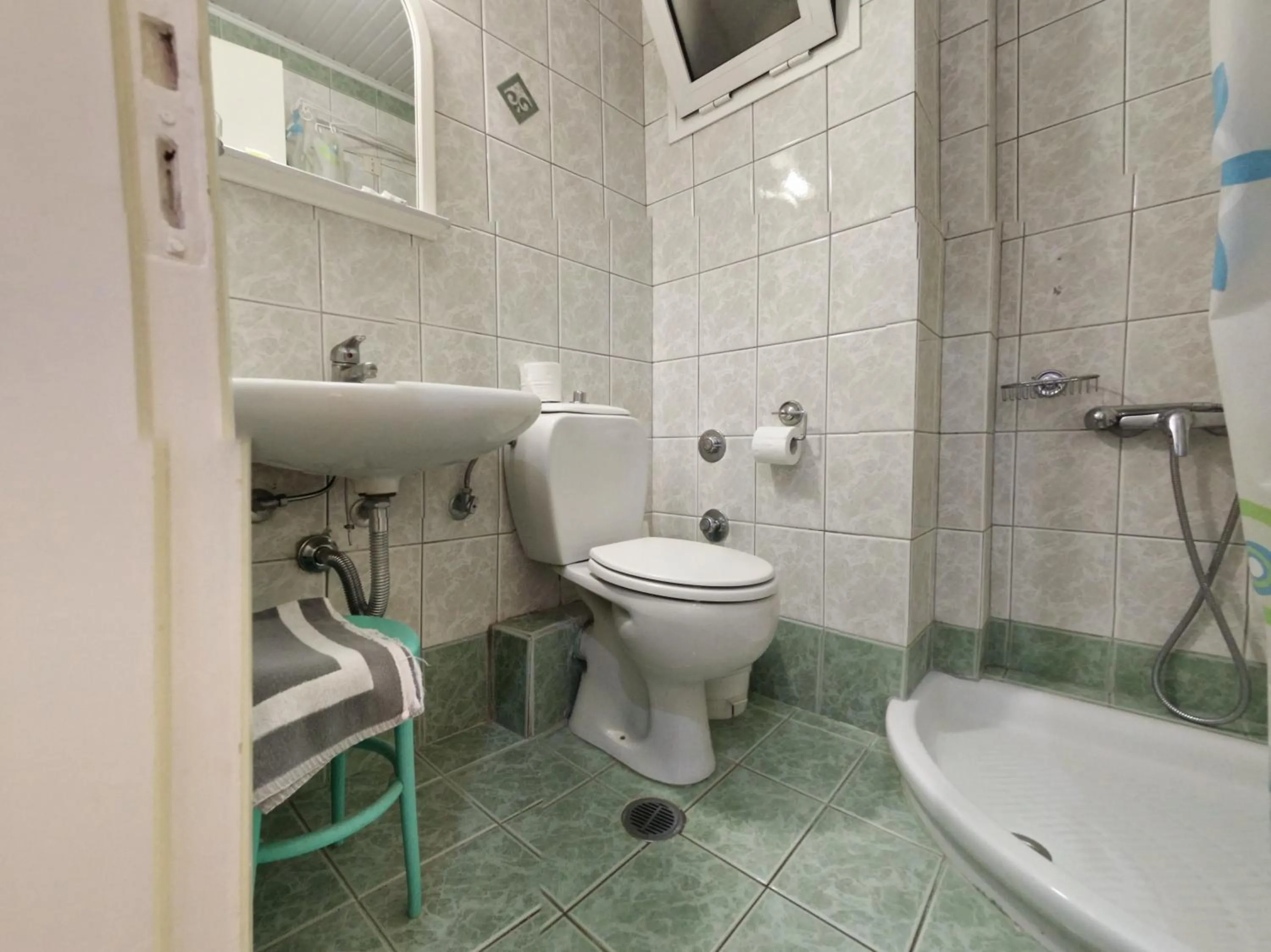 Bathroom in Delfini Hotel