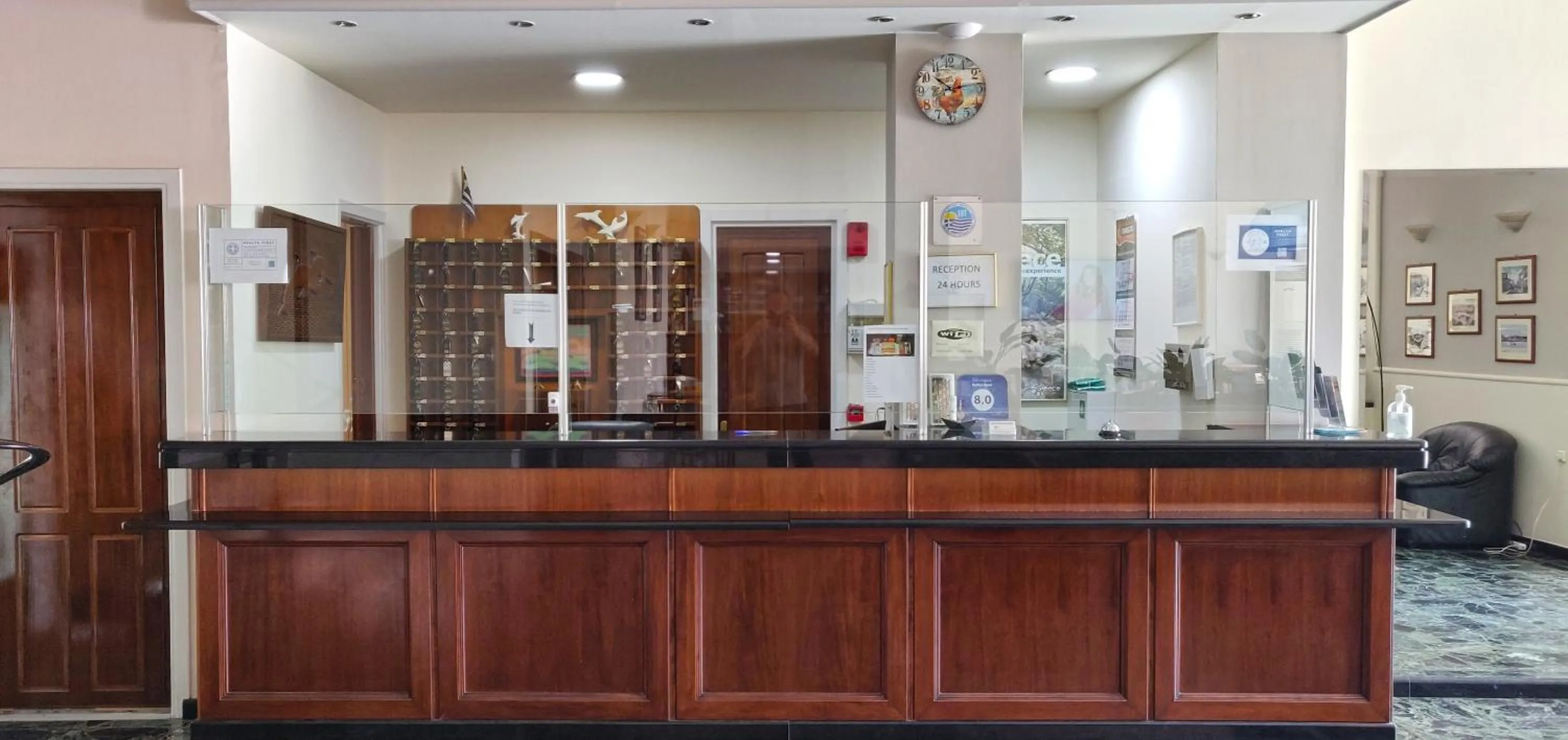 Lobby or reception in Delfini Hotel