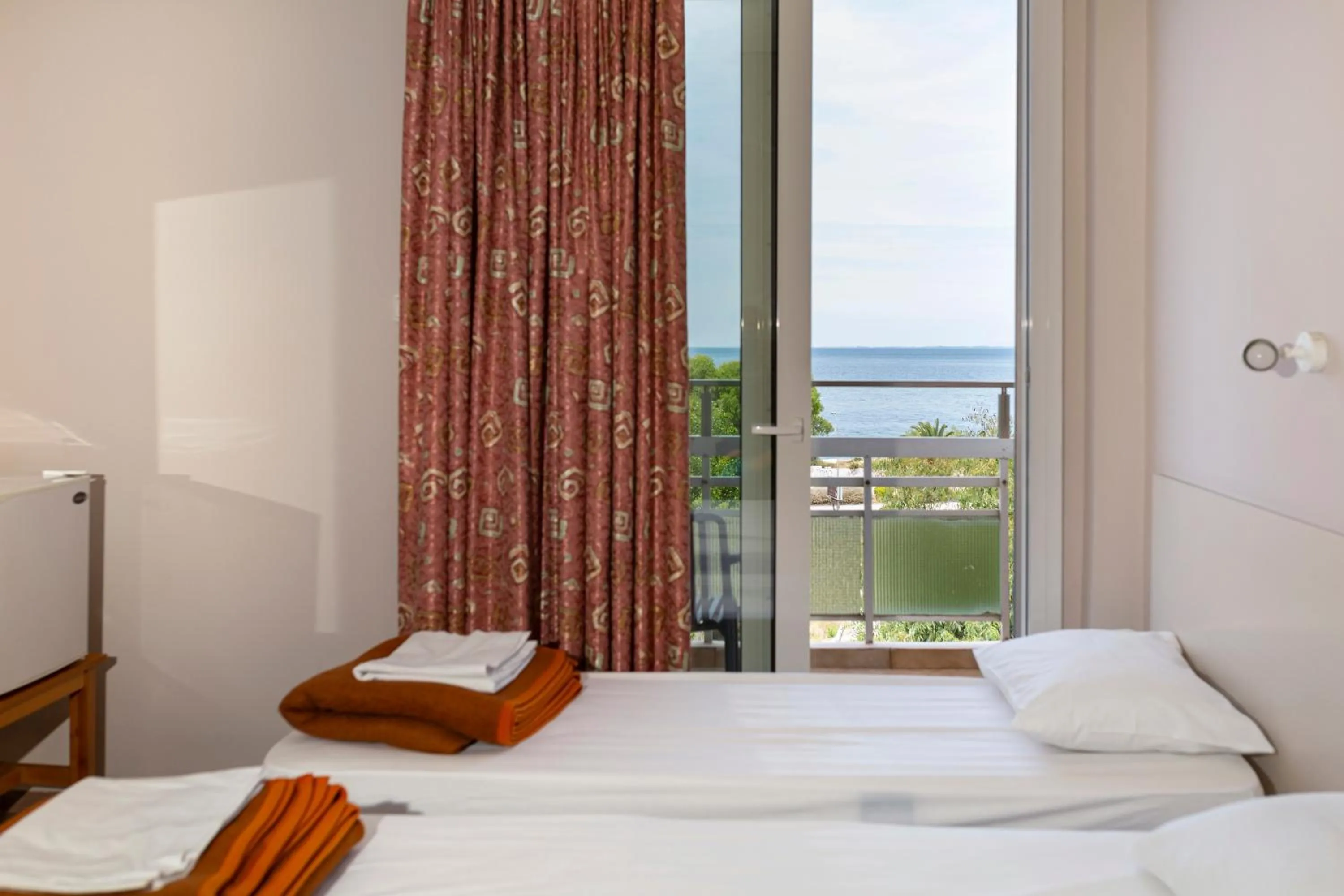 View (from property/room), Bed in Delfini Hotel