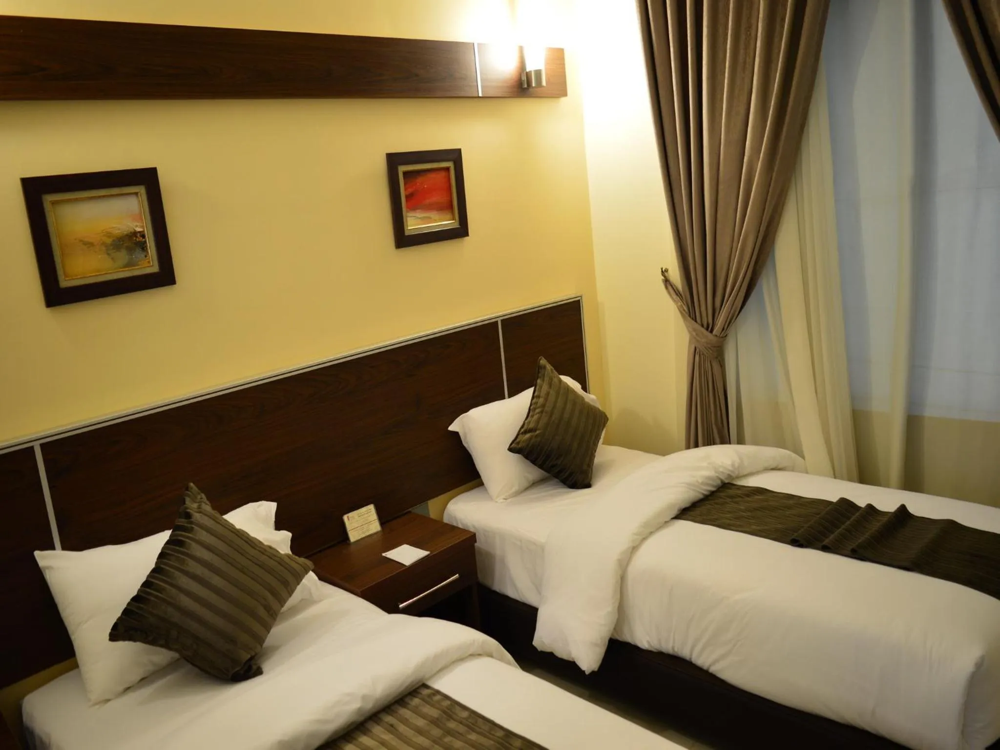 Bed in Ream Hotel Amman