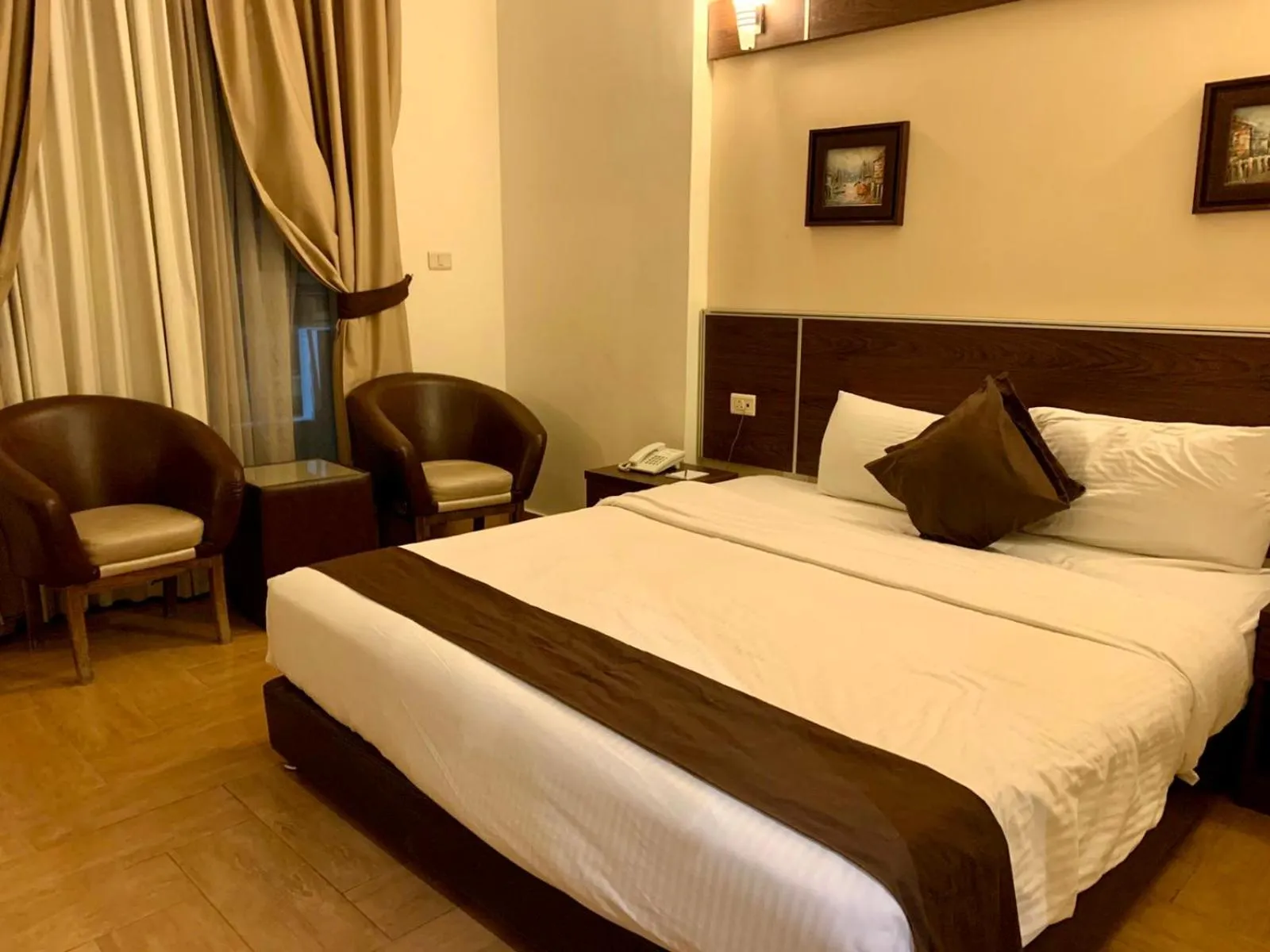 Bed in Ream Hotel Amman