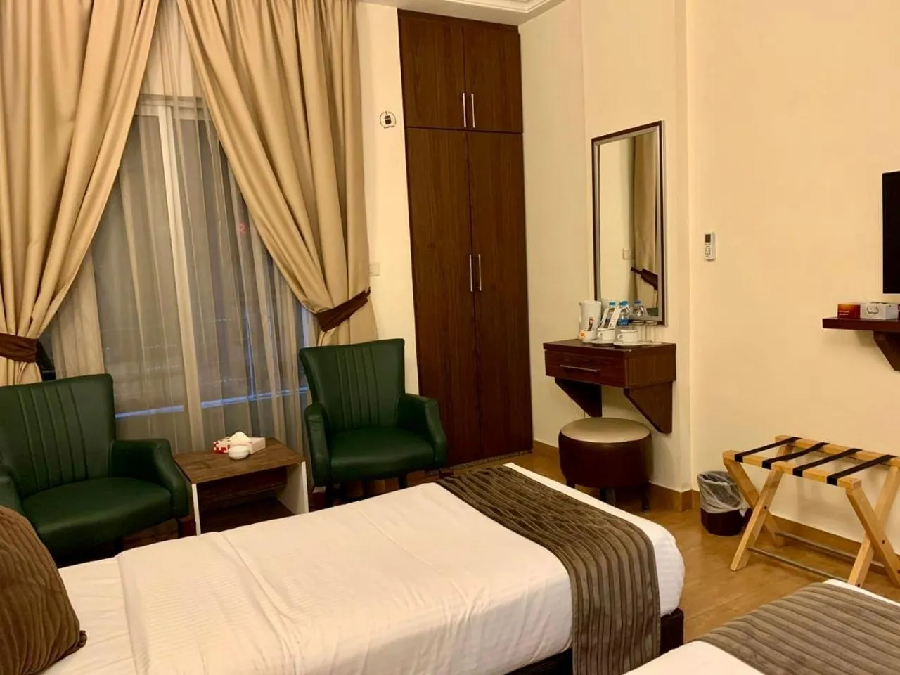 Bed in Ream Hotel Amman