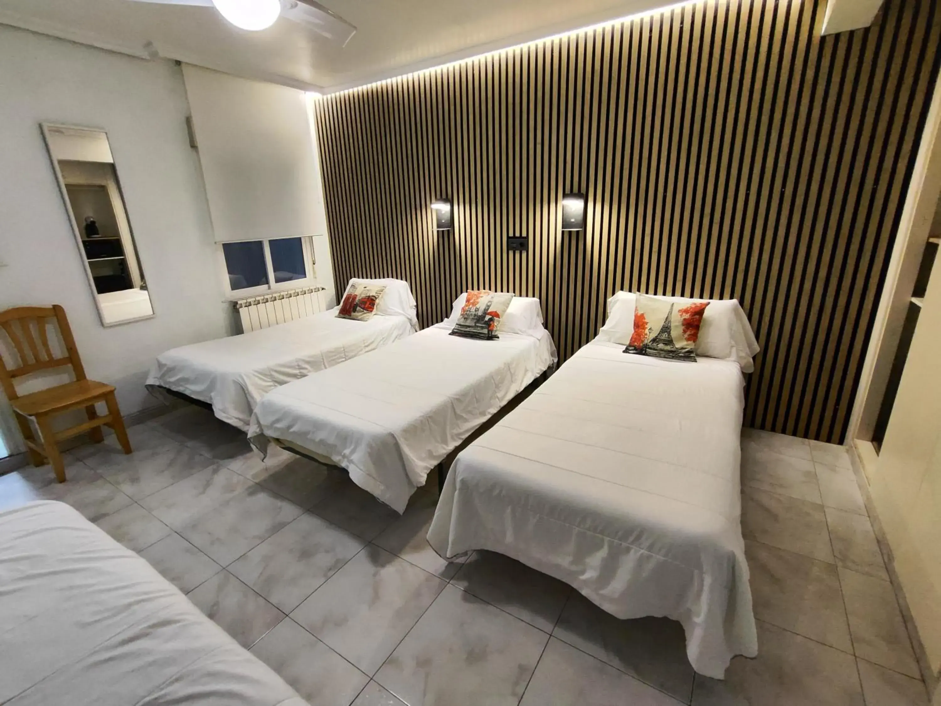 Quadruple Room in Hostal Lucy Quadruple Room in Hostal Lucy