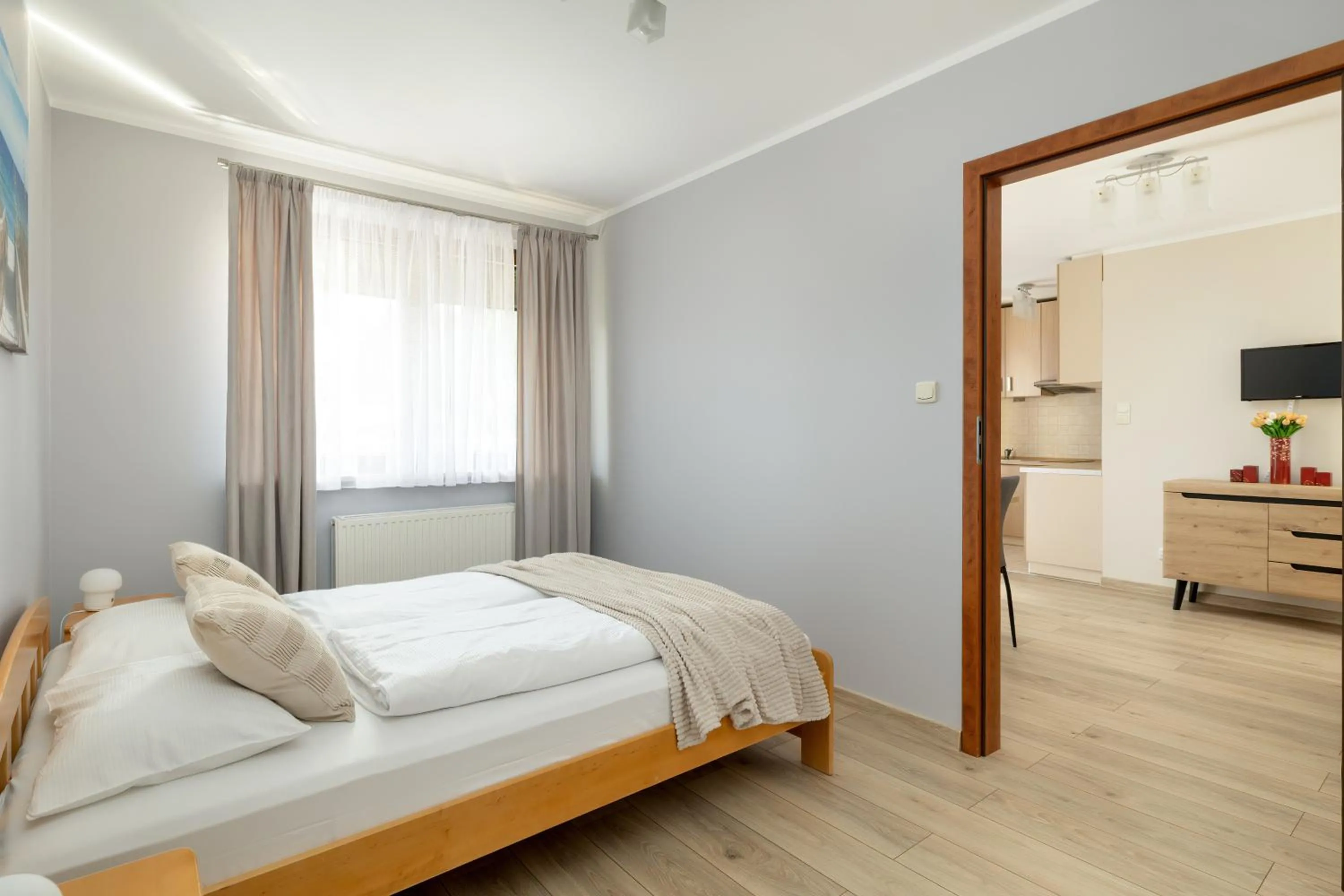 Bed in Apartamenty Żeromskiego 29 by Noclegi Renters