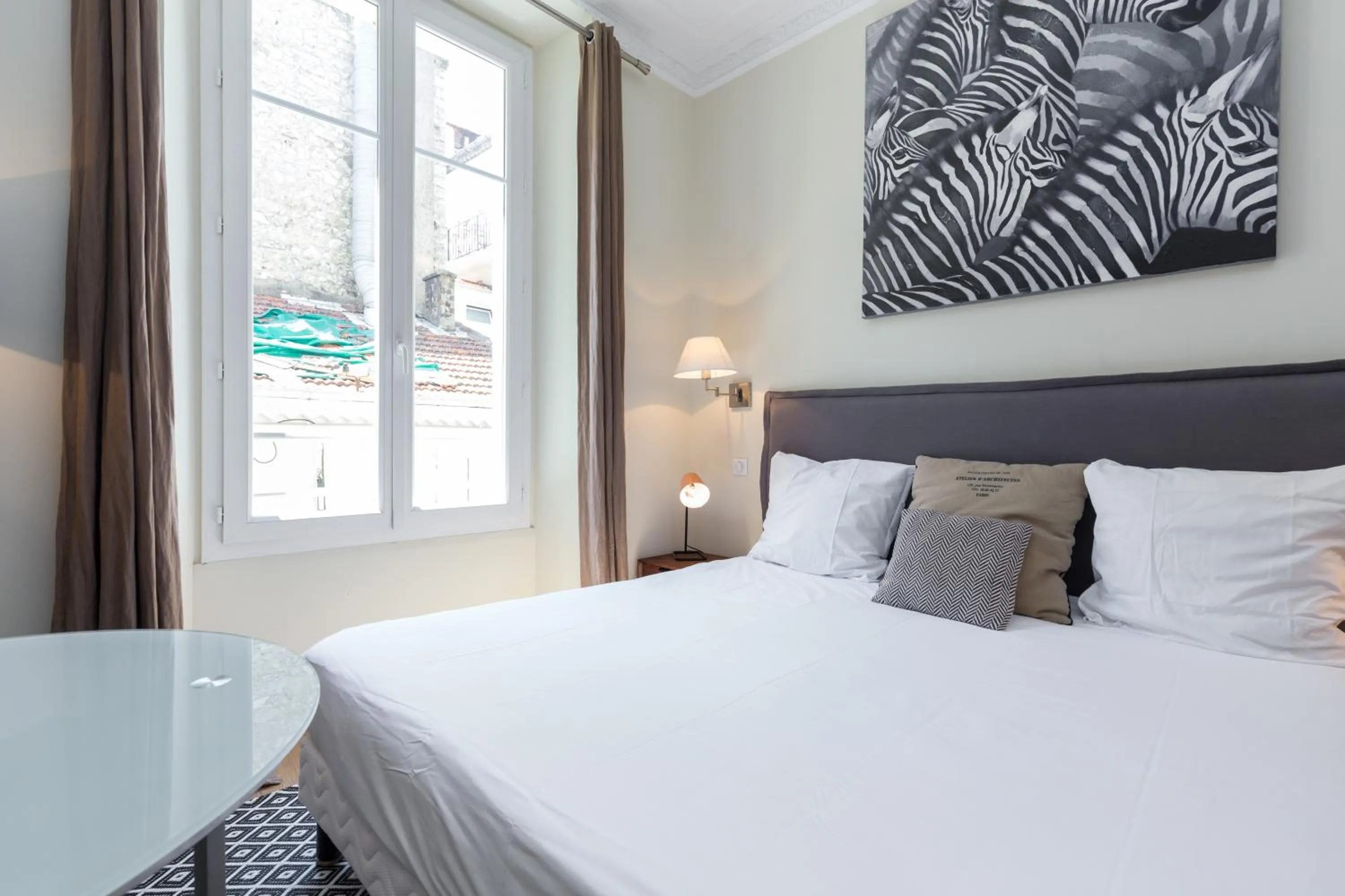 Photo of the whole room, Bed in Florella Jean Jaures Apartment