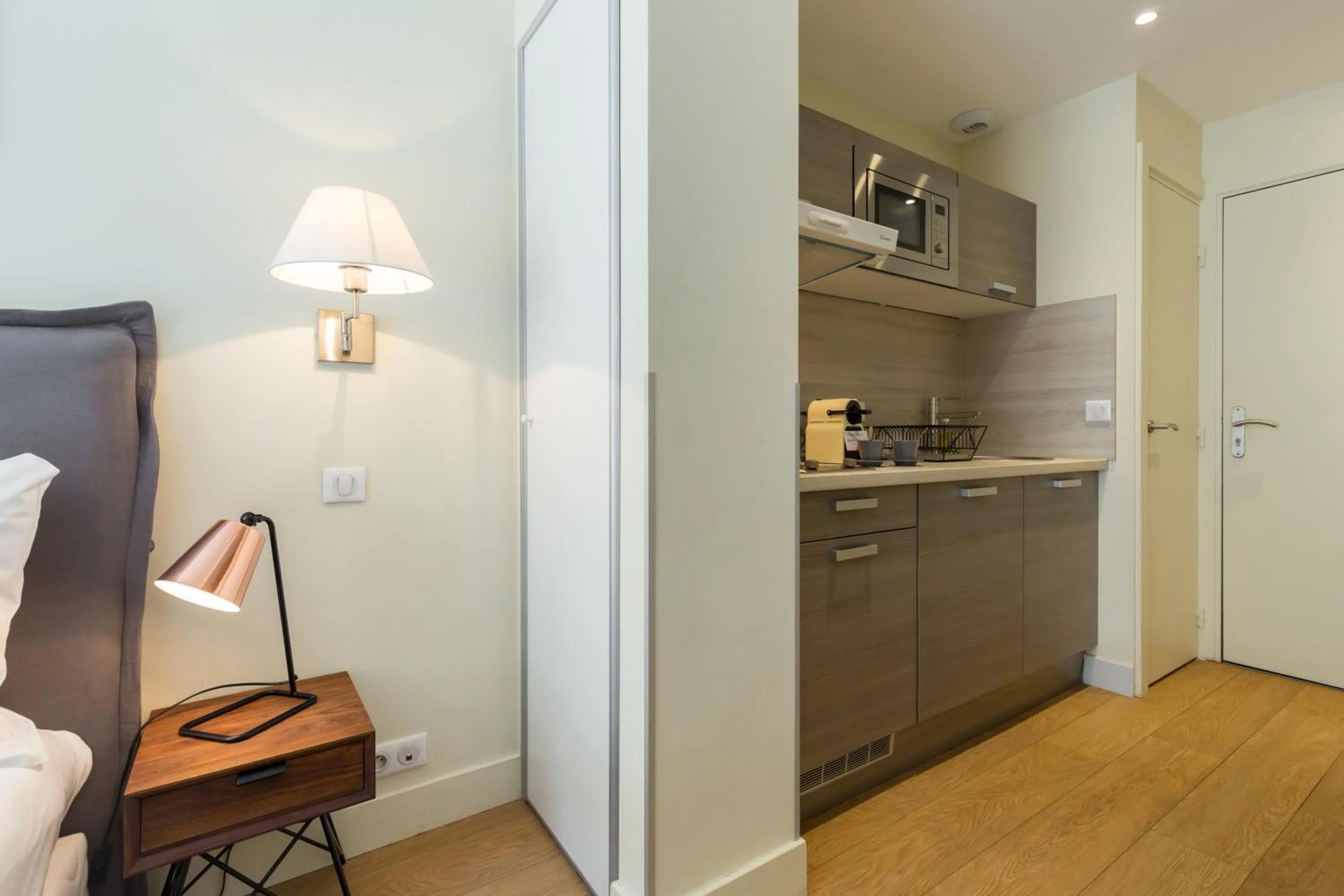 Kitchen or kitchenette, Bed in Florella Jean Jaures Apartment
