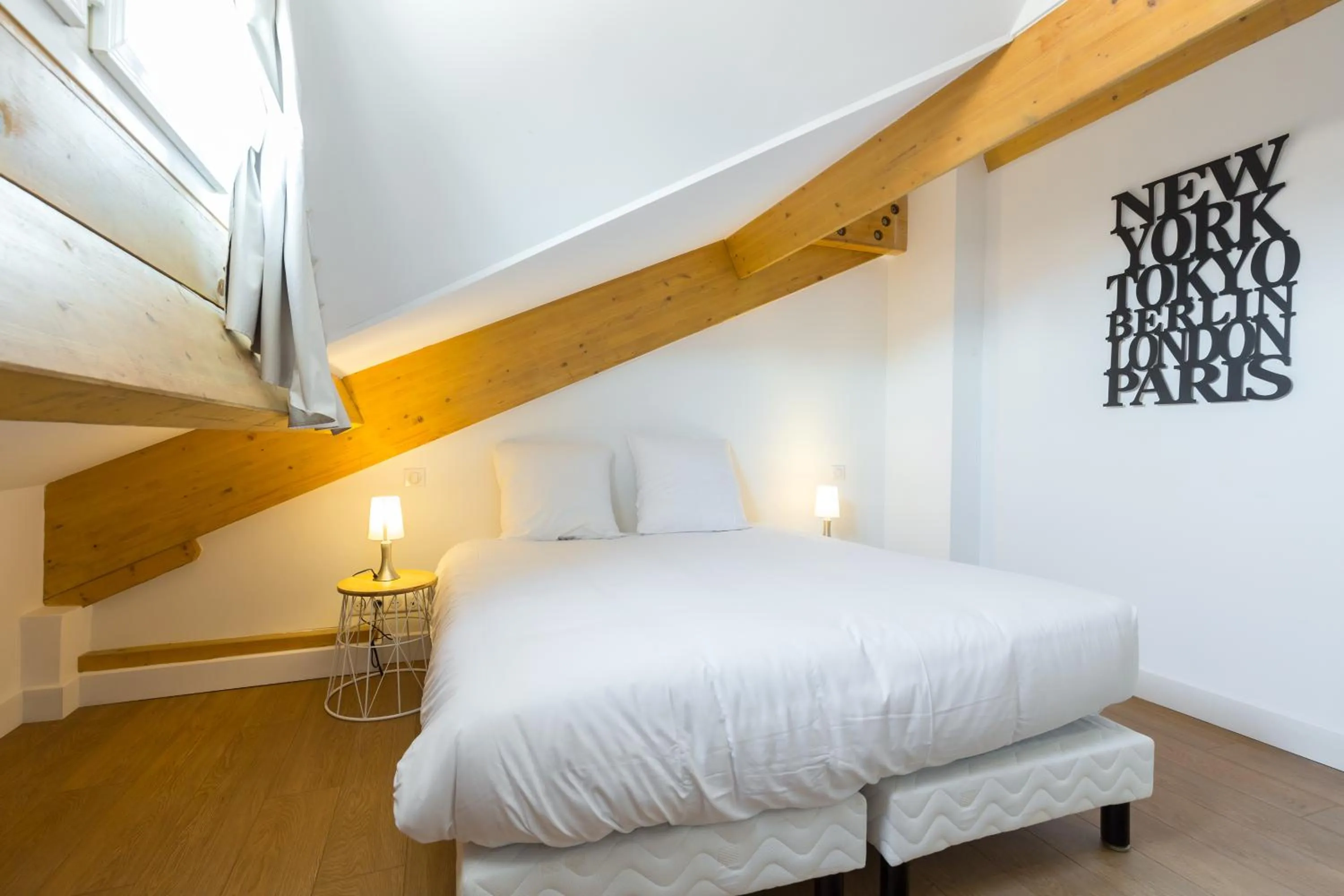 Photo of the whole room, Bed in Florella Jean Jaures Apartment