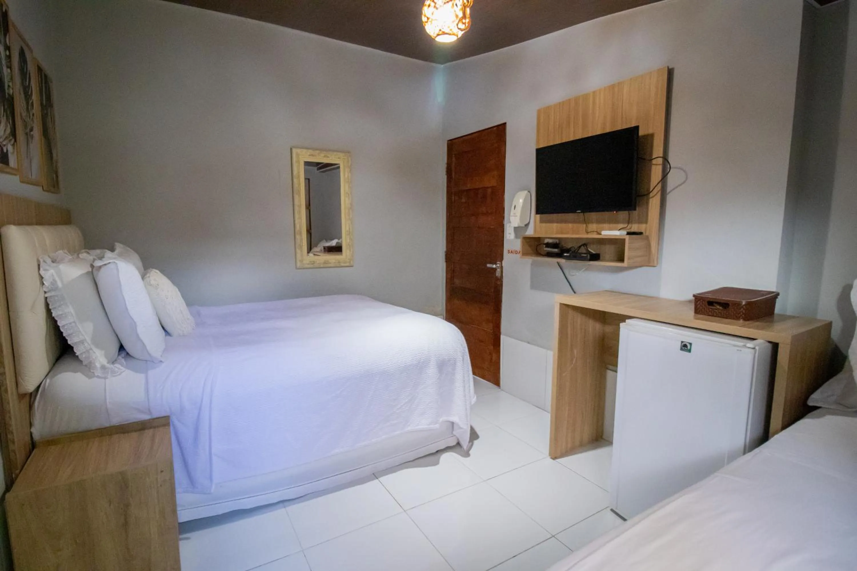 Bed in Pousada da Leide