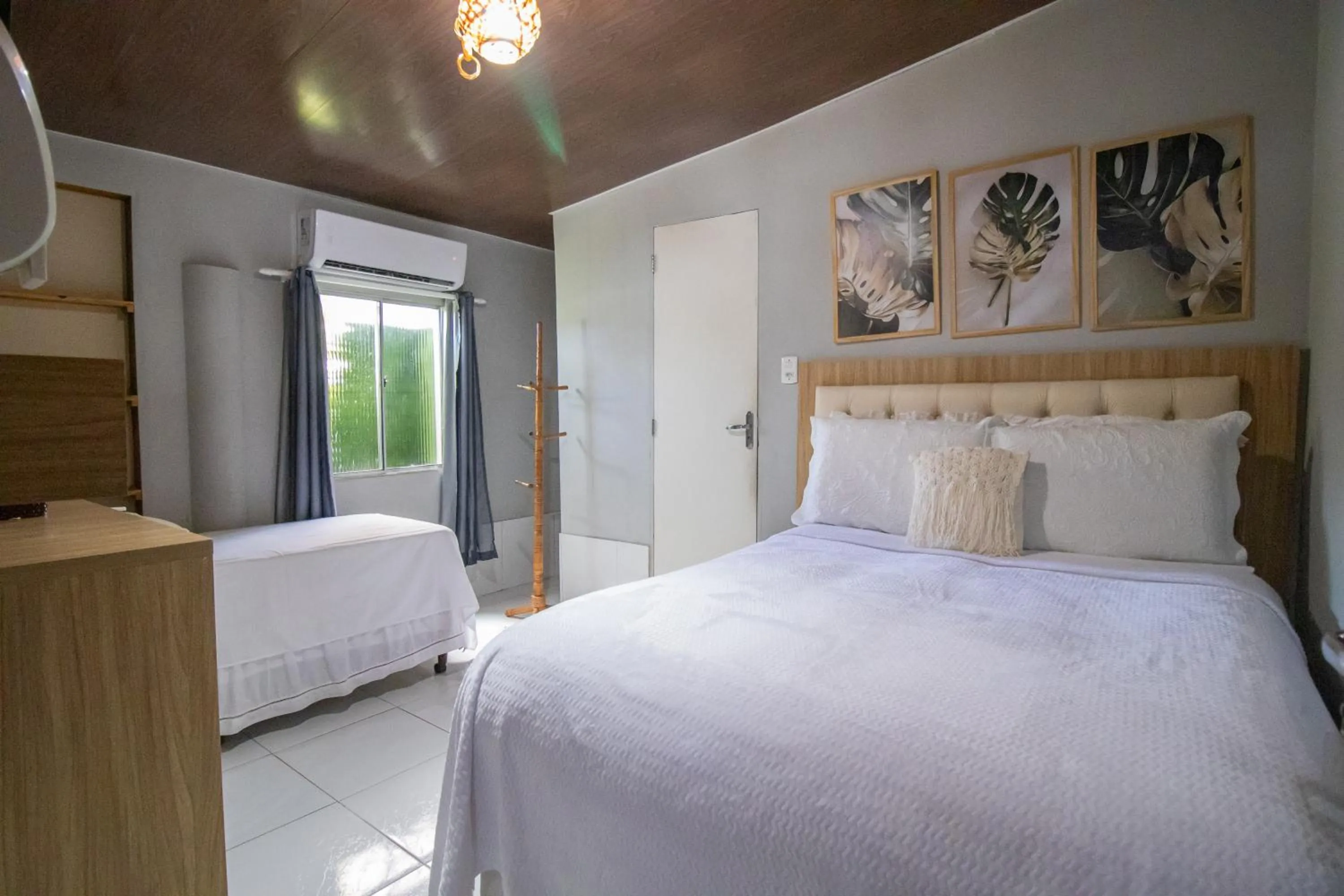 Bed in Pousada da Leide