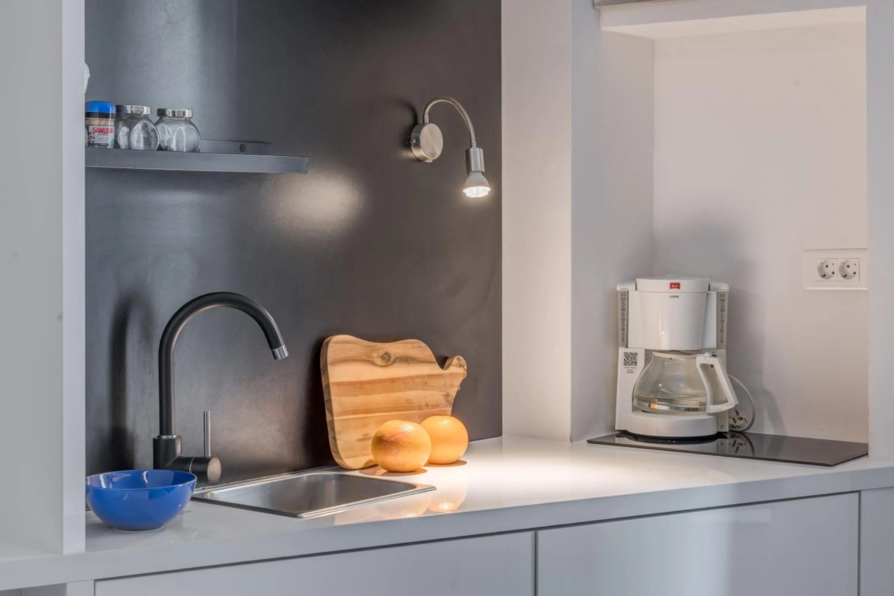 Kitchen or kitchenette in Versi & Note Luxury Rooms