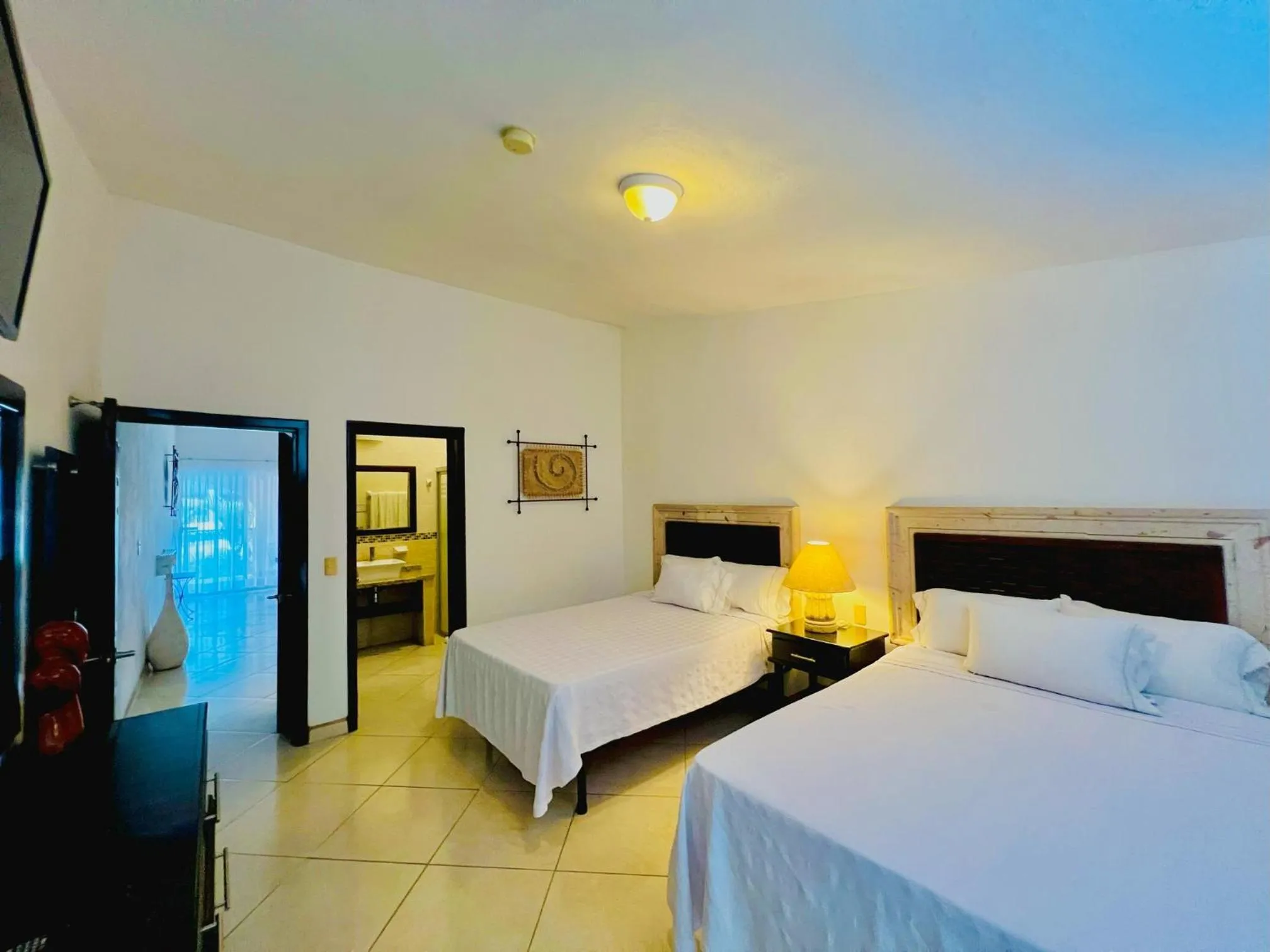 Bed in Los Picos Hotel & Suites Bucerias