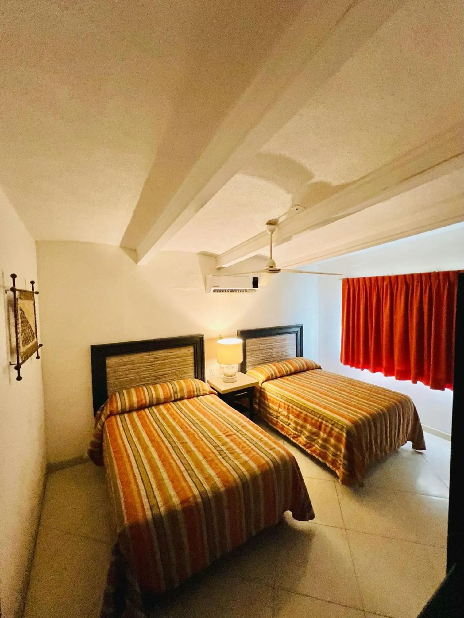 Photo of the whole room, Bed in Los Picos Hotel & Suites Bucerias