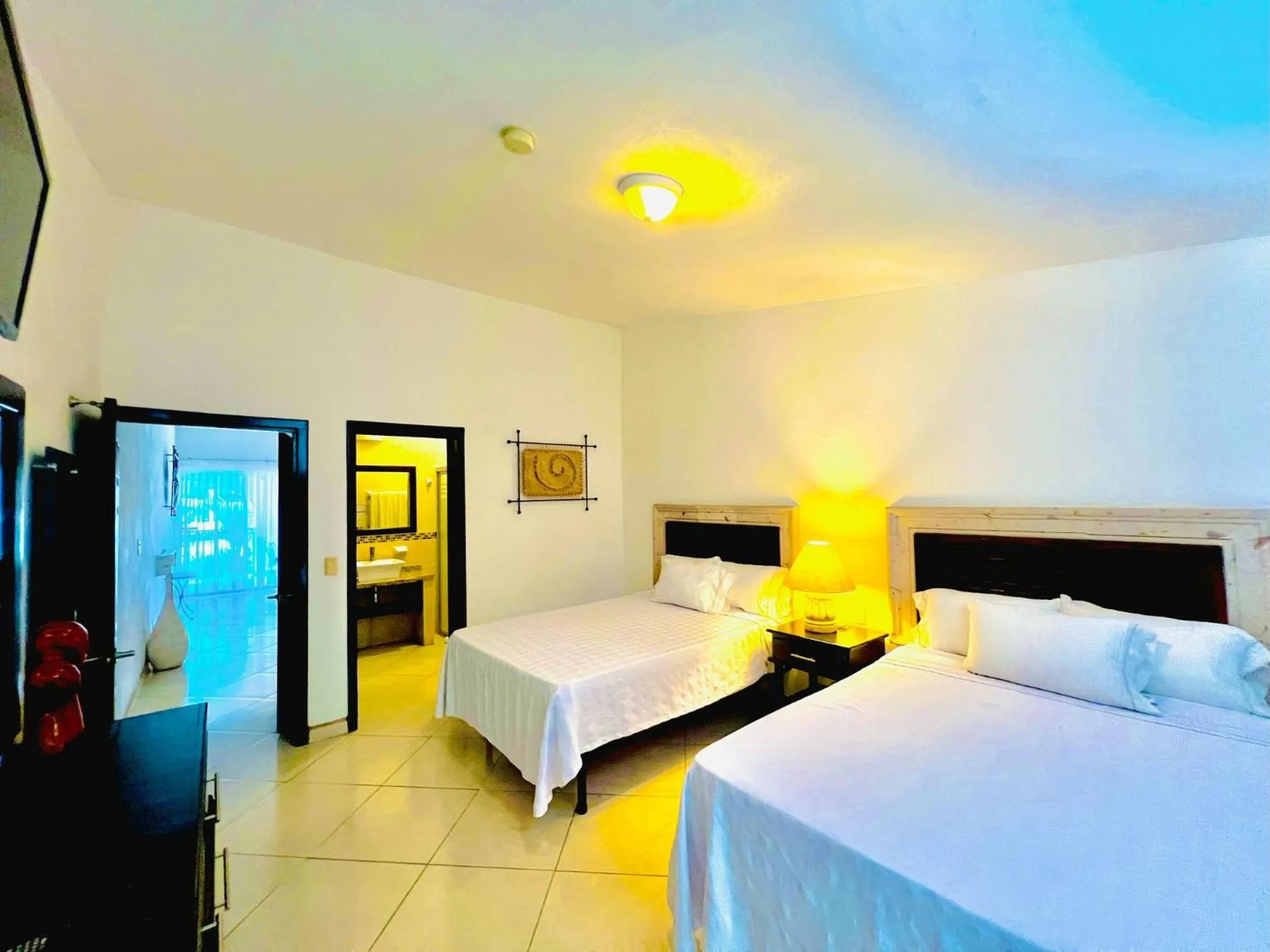 Bed in Los Picos Hotel & Suites Bucerias