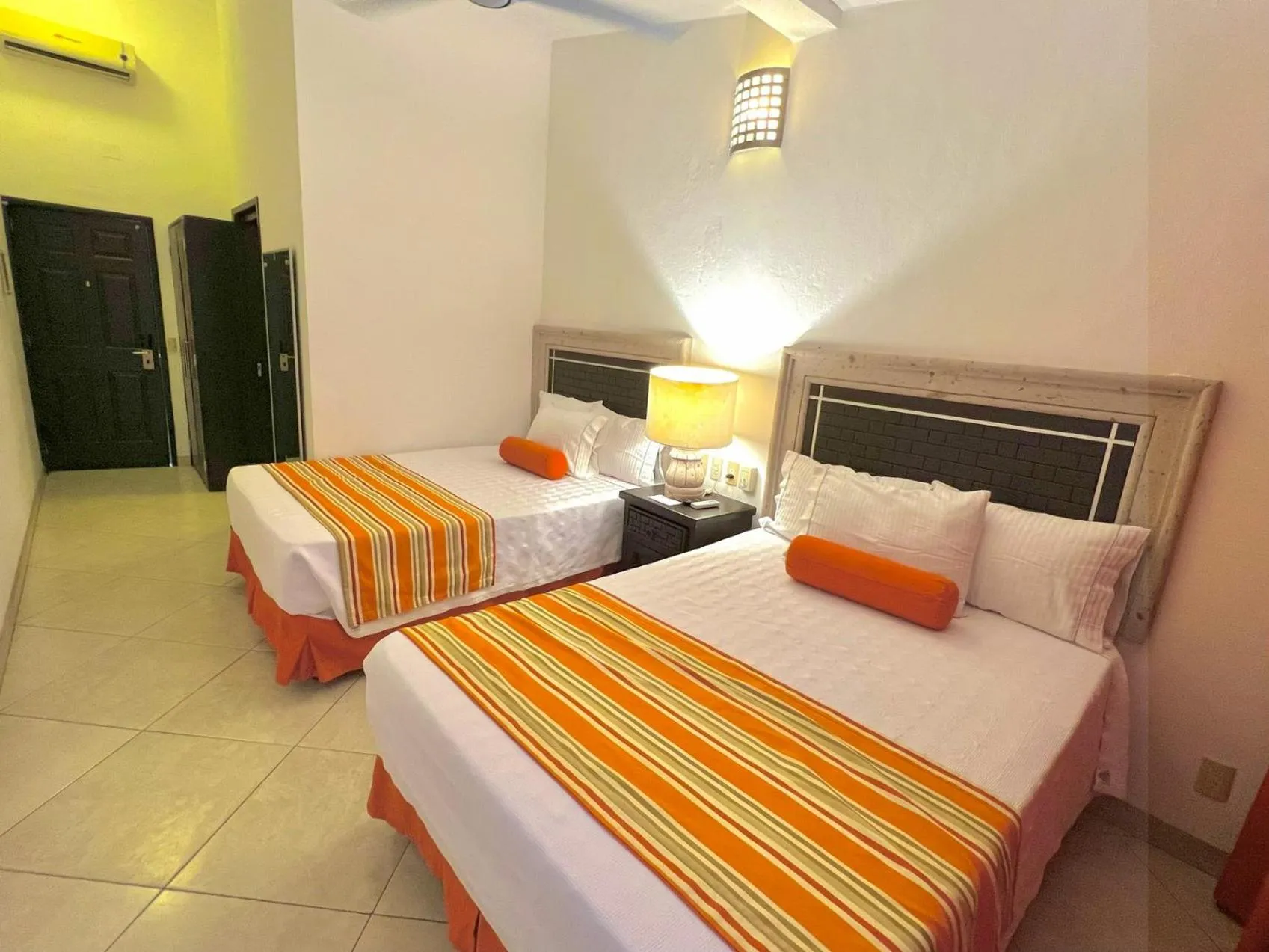 Bed in Los Picos Hotel & Suites Bucerias