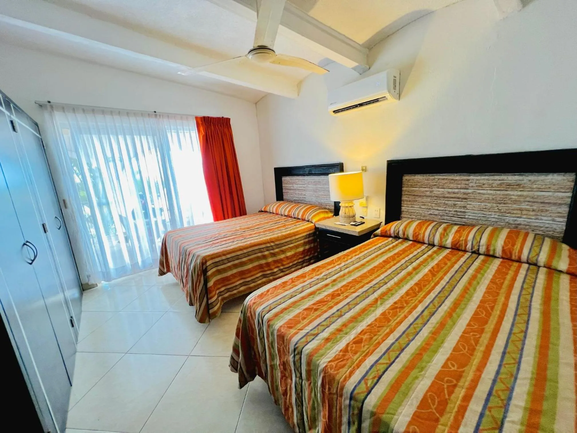 Bed in Los Picos Hotel & Suites Bucerias