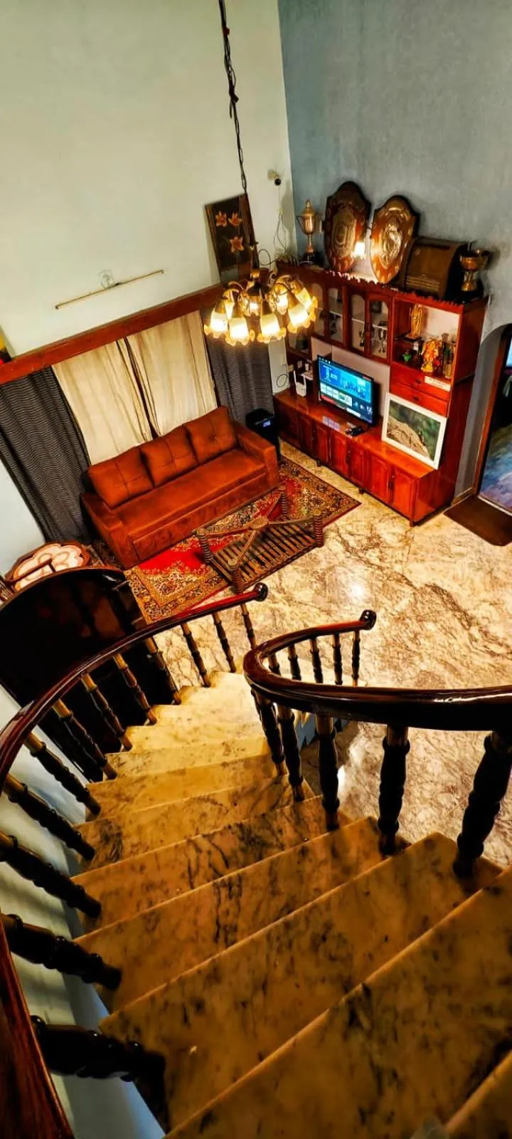 Communal lounge/ TV room in Brookevally Palace Homestay