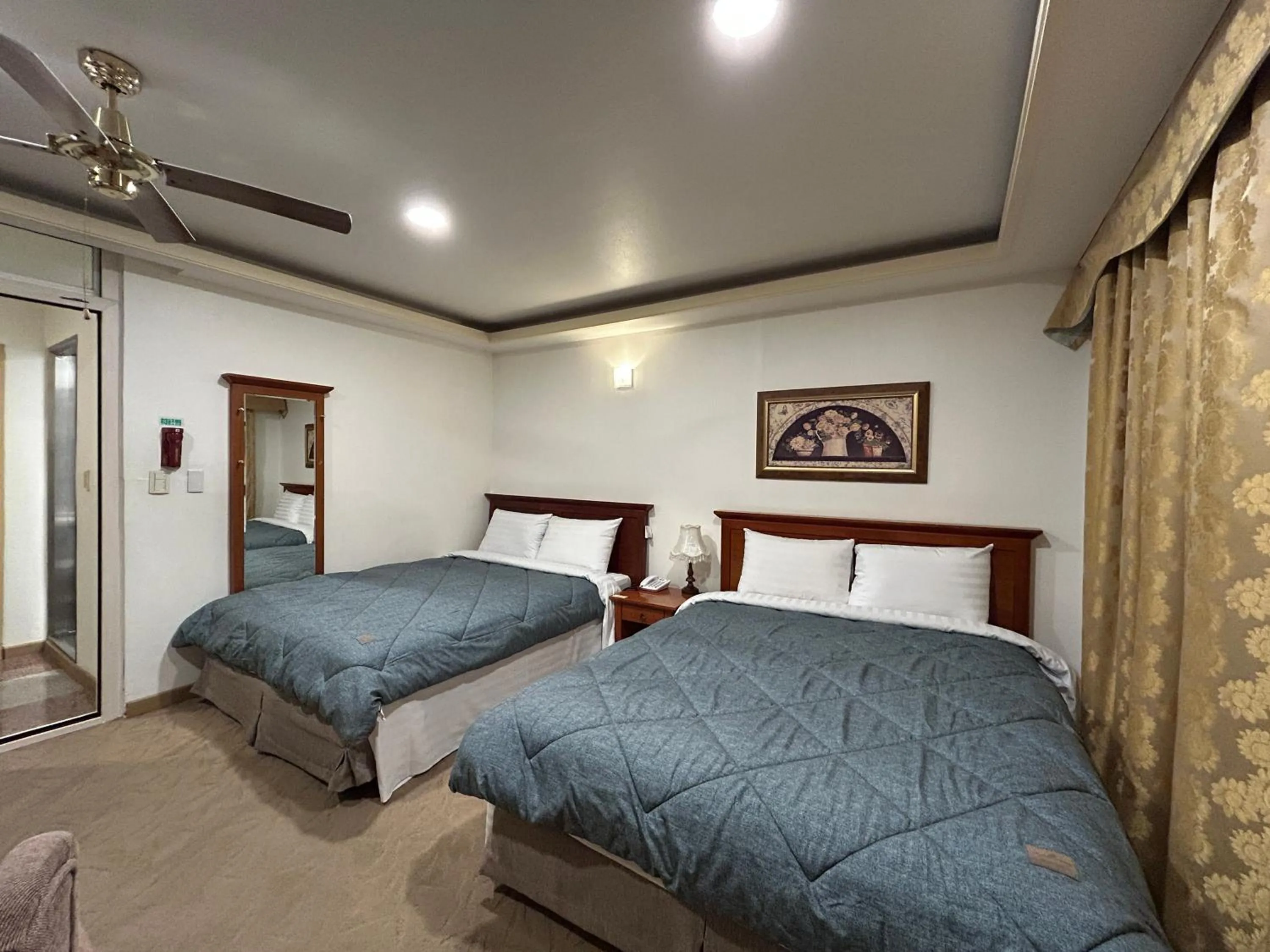 Bed in Asia Tourist Hotel