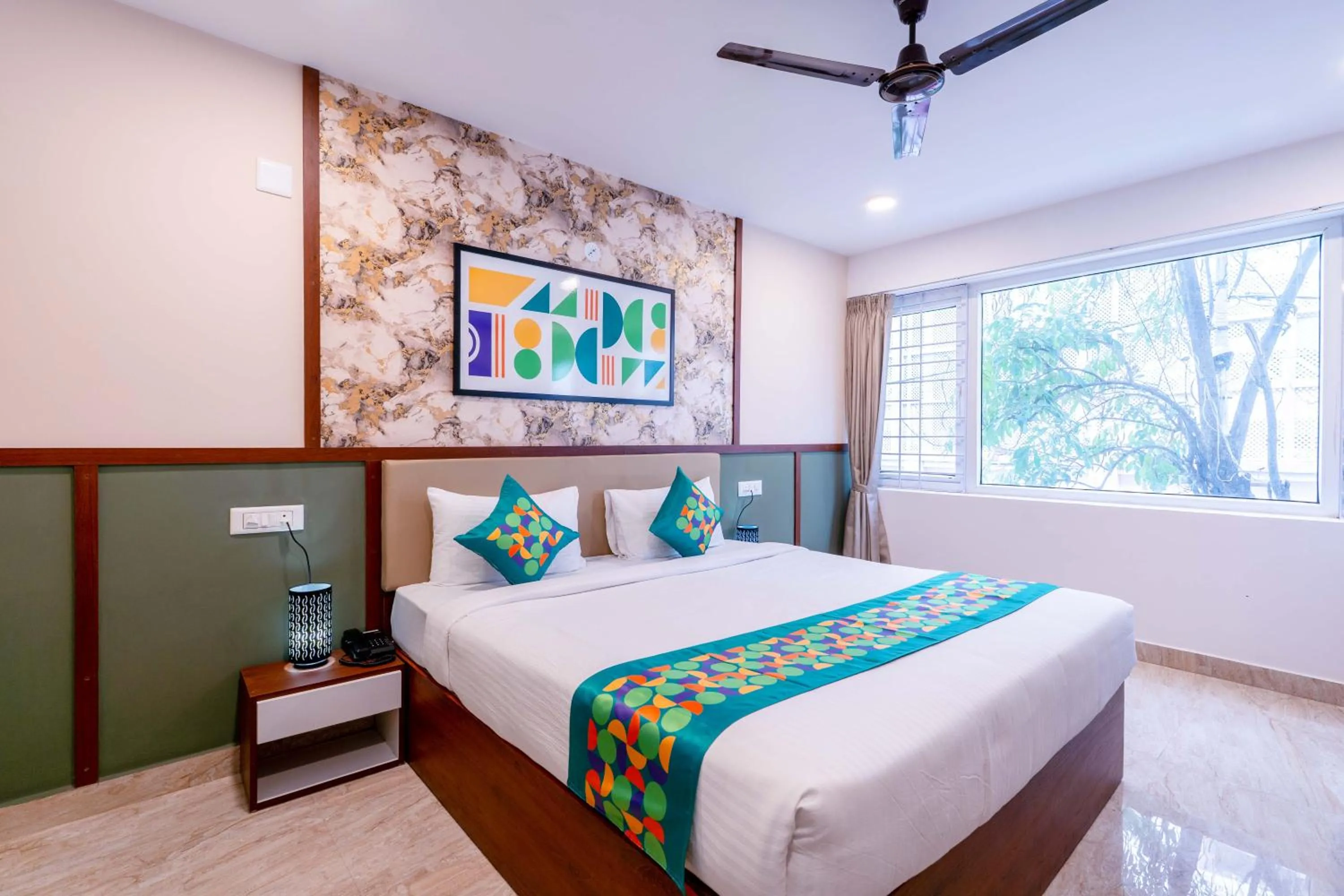 Bedroom, Bed in Treebo Emirates Suites Indiranagar