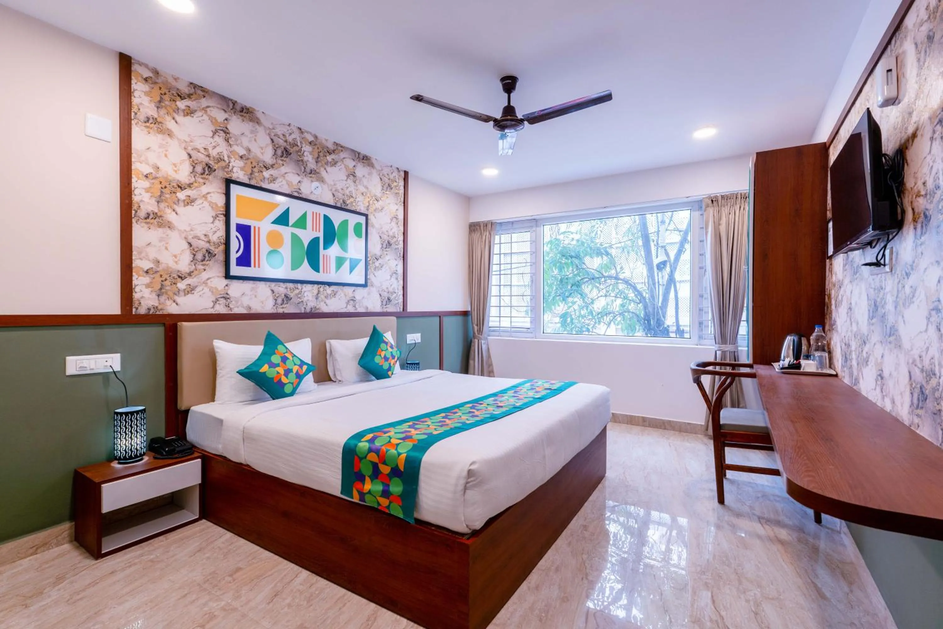 Bedroom, Bed in Treebo Emirates Suites Indiranagar