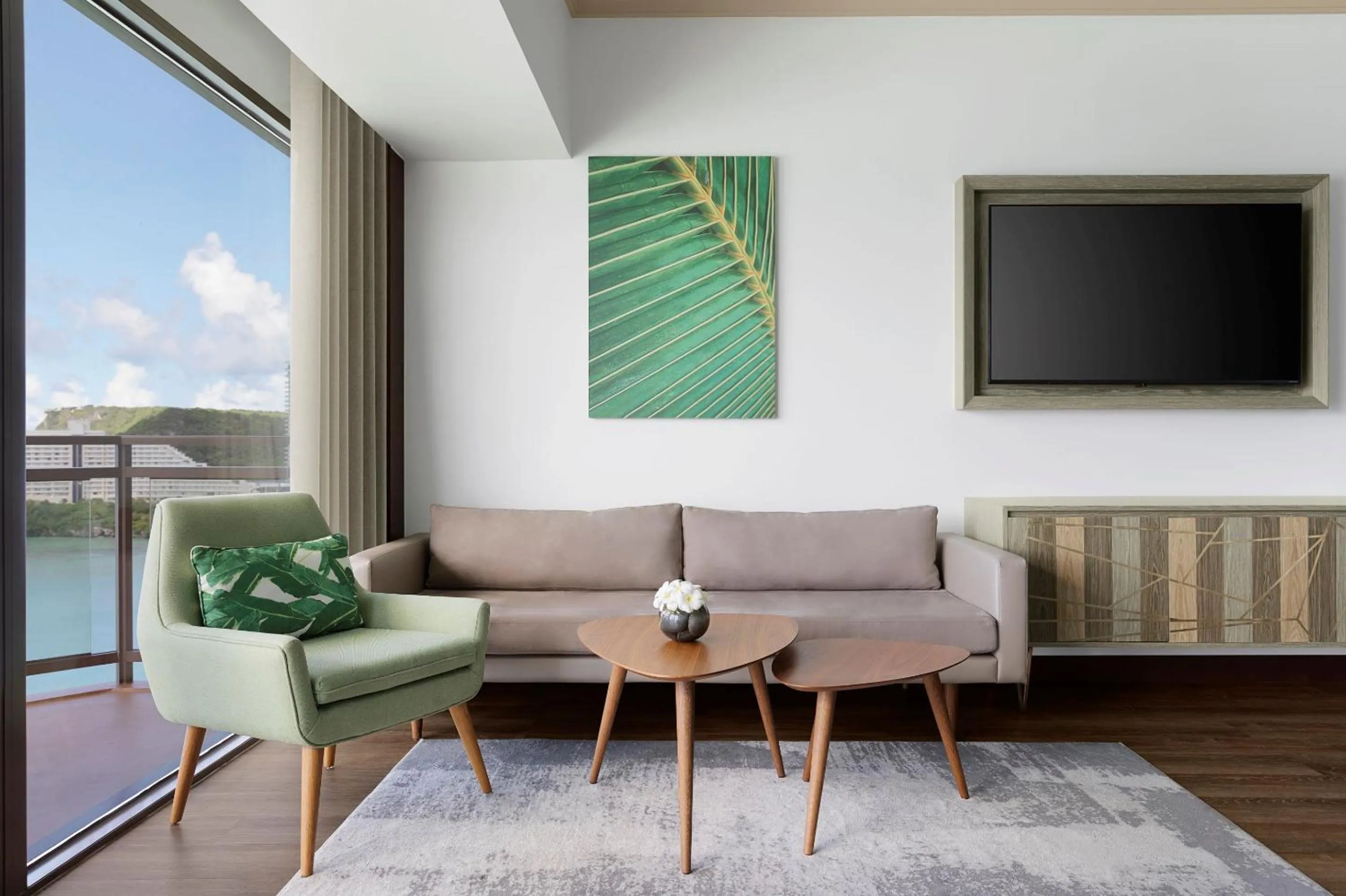 Communal lounge/ TV room in Dusit Beach Resort Guam