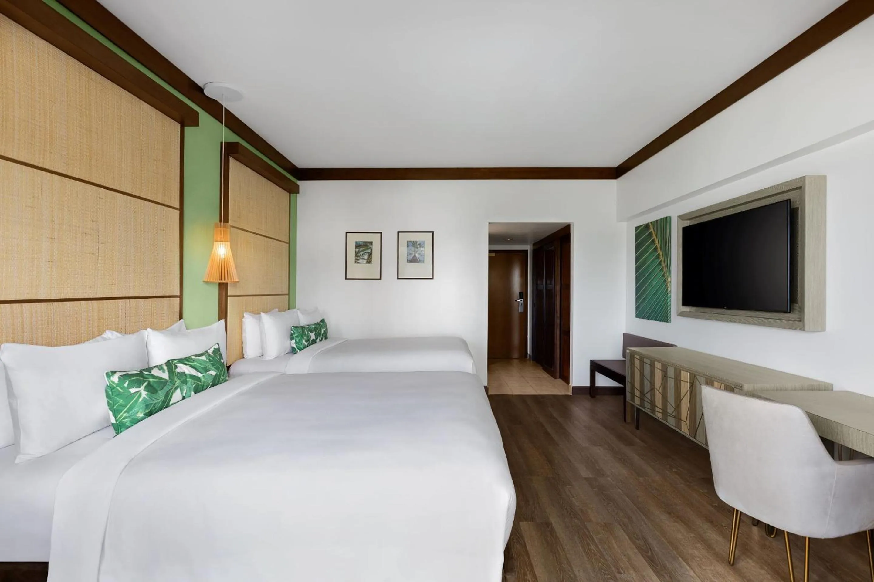 Communal lounge/ TV room, Bed in Dusit Beach Resort Guam