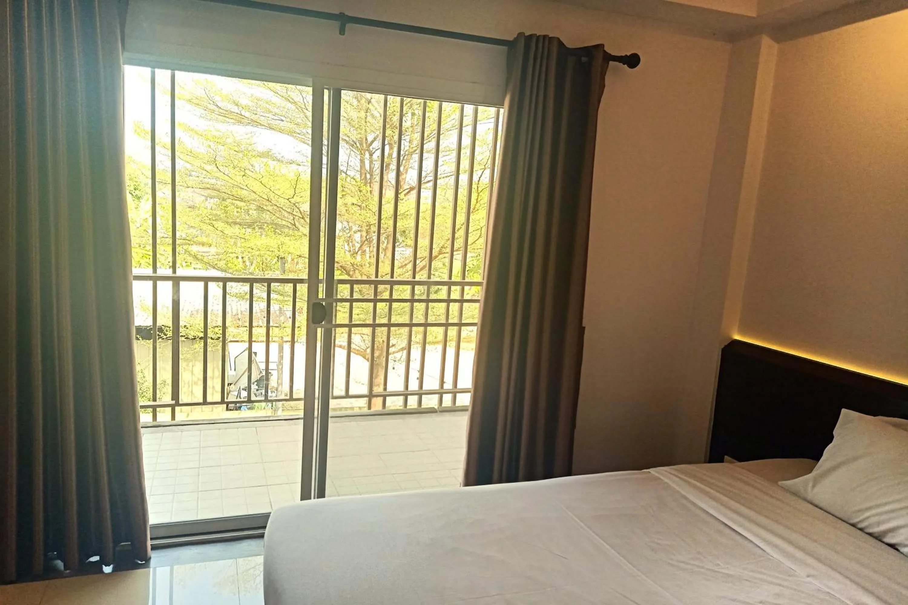 Bed in Smile Place Hotel Chiang Rai