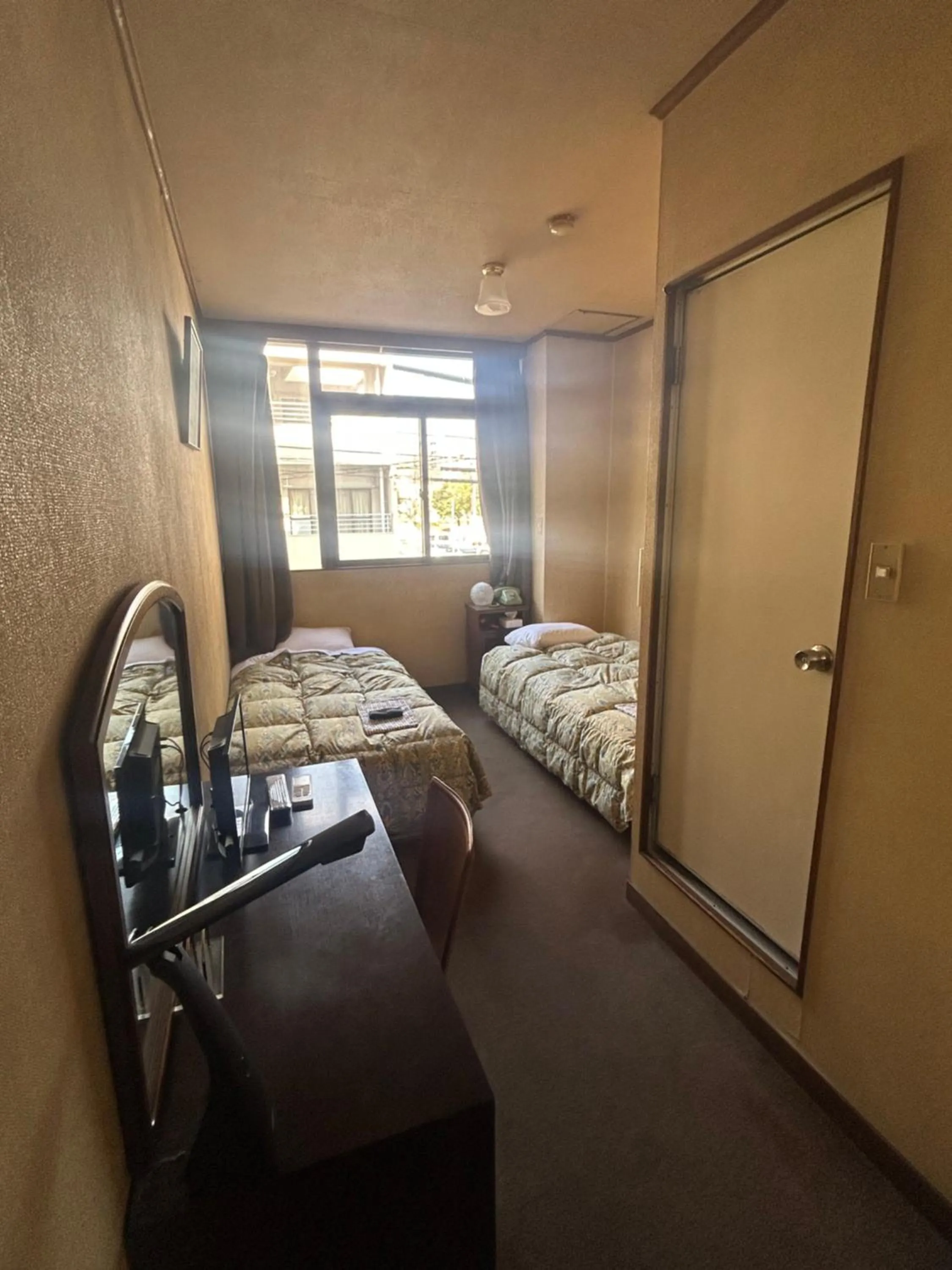 Bed in Business Hotel Nakayama