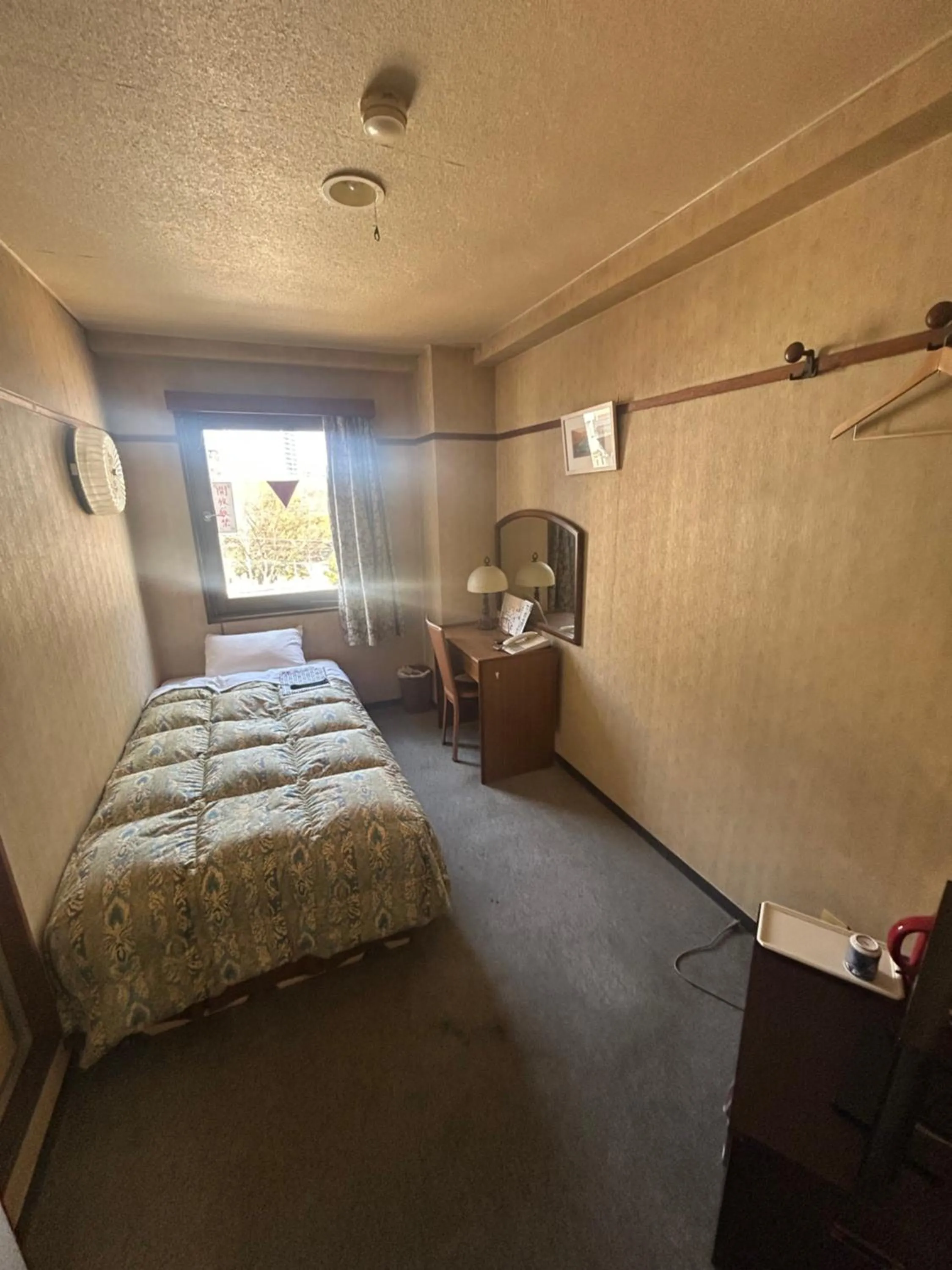 Bed in Business Hotel Nakayama