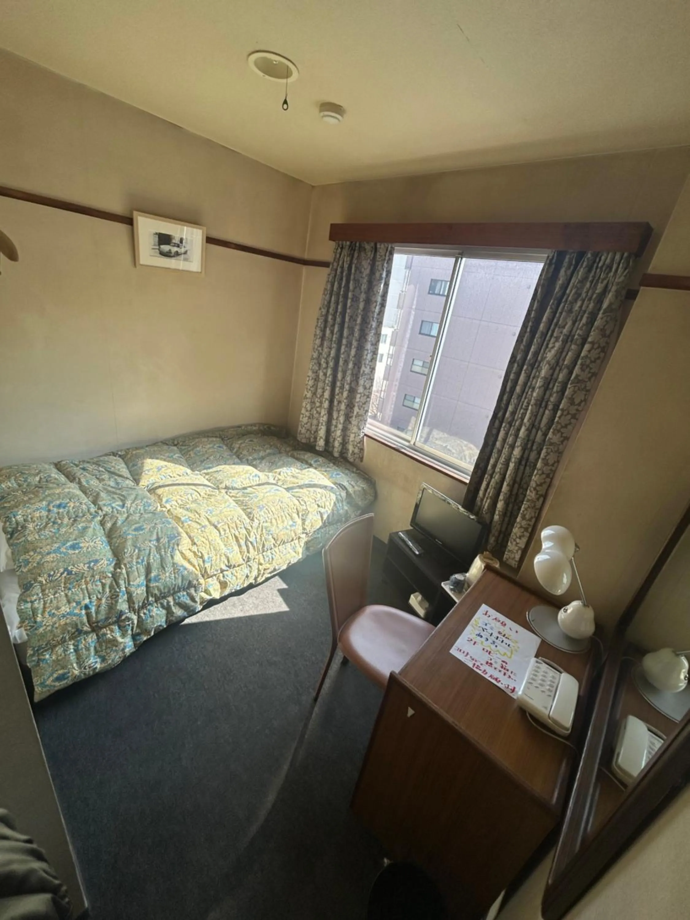 Bed in Business Hotel Nakayama